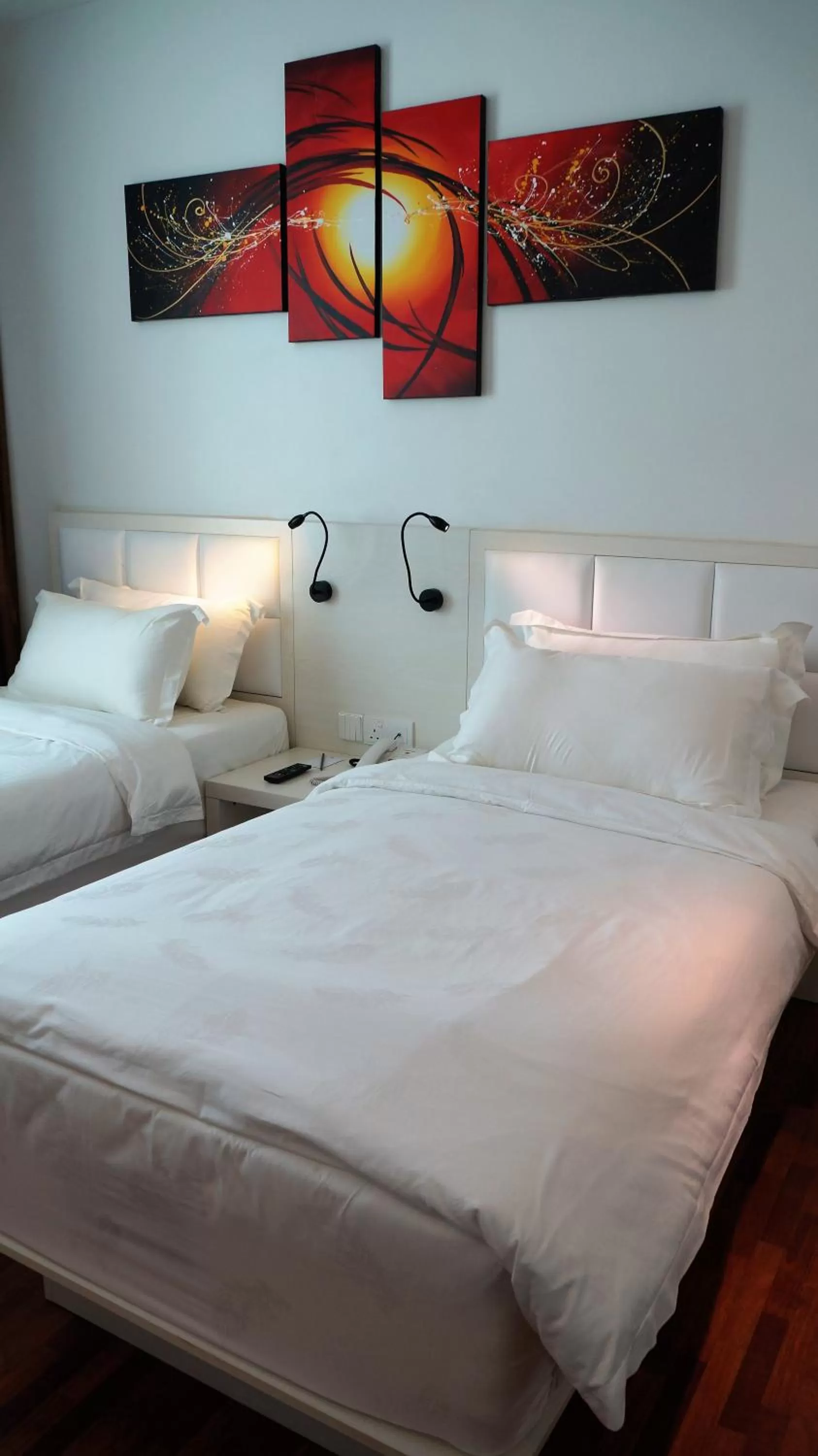 Bed in Pine Garden Hotel