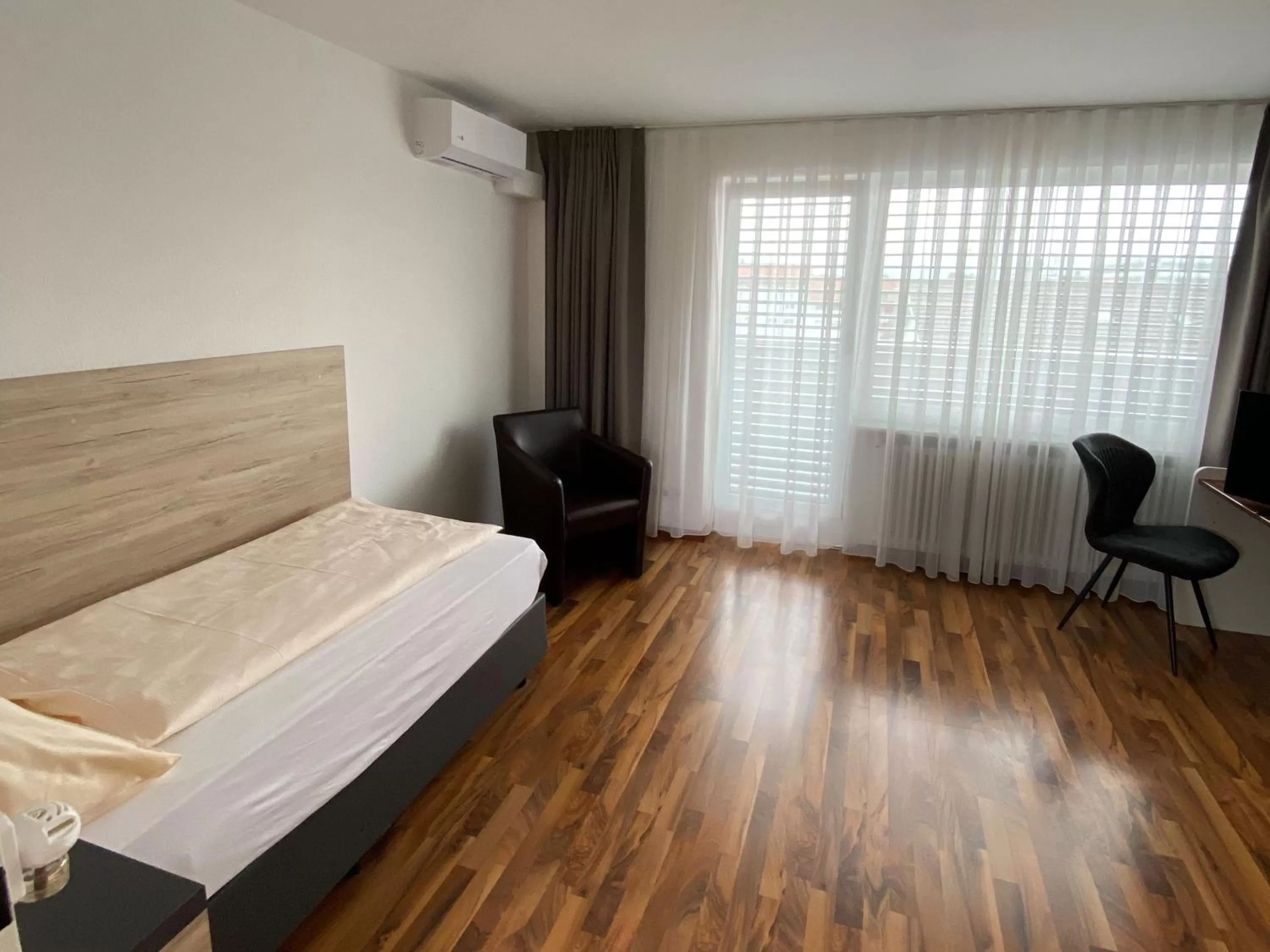 Bed in ZUM ZIEL Hotel Grenzach-Wyhlen bei Basel