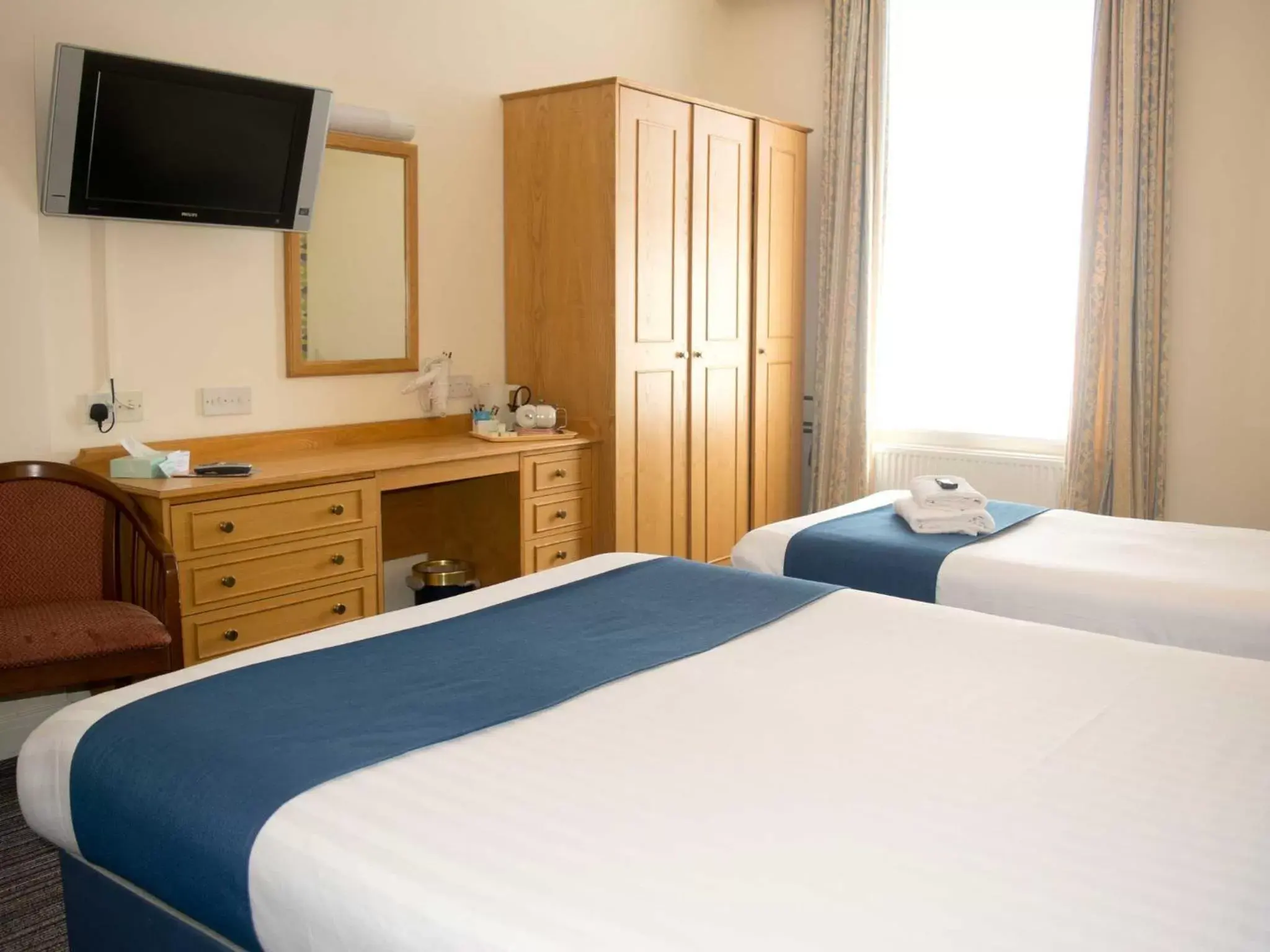 Bed in TLH Carlton Hotel and Spa - TLH Leisure and Entertainment Resort