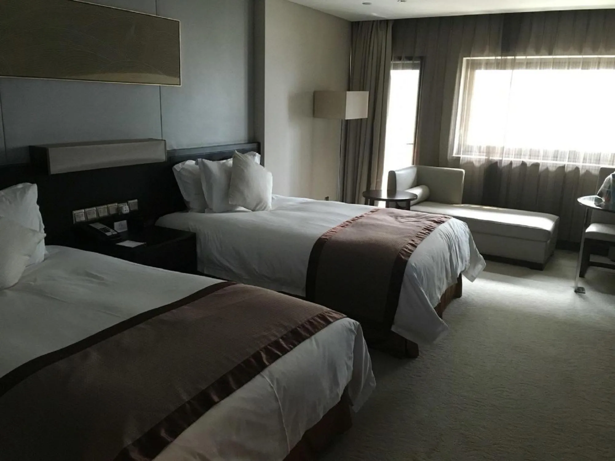 Bed in Howard Johnson IFC Plaza Ningbo