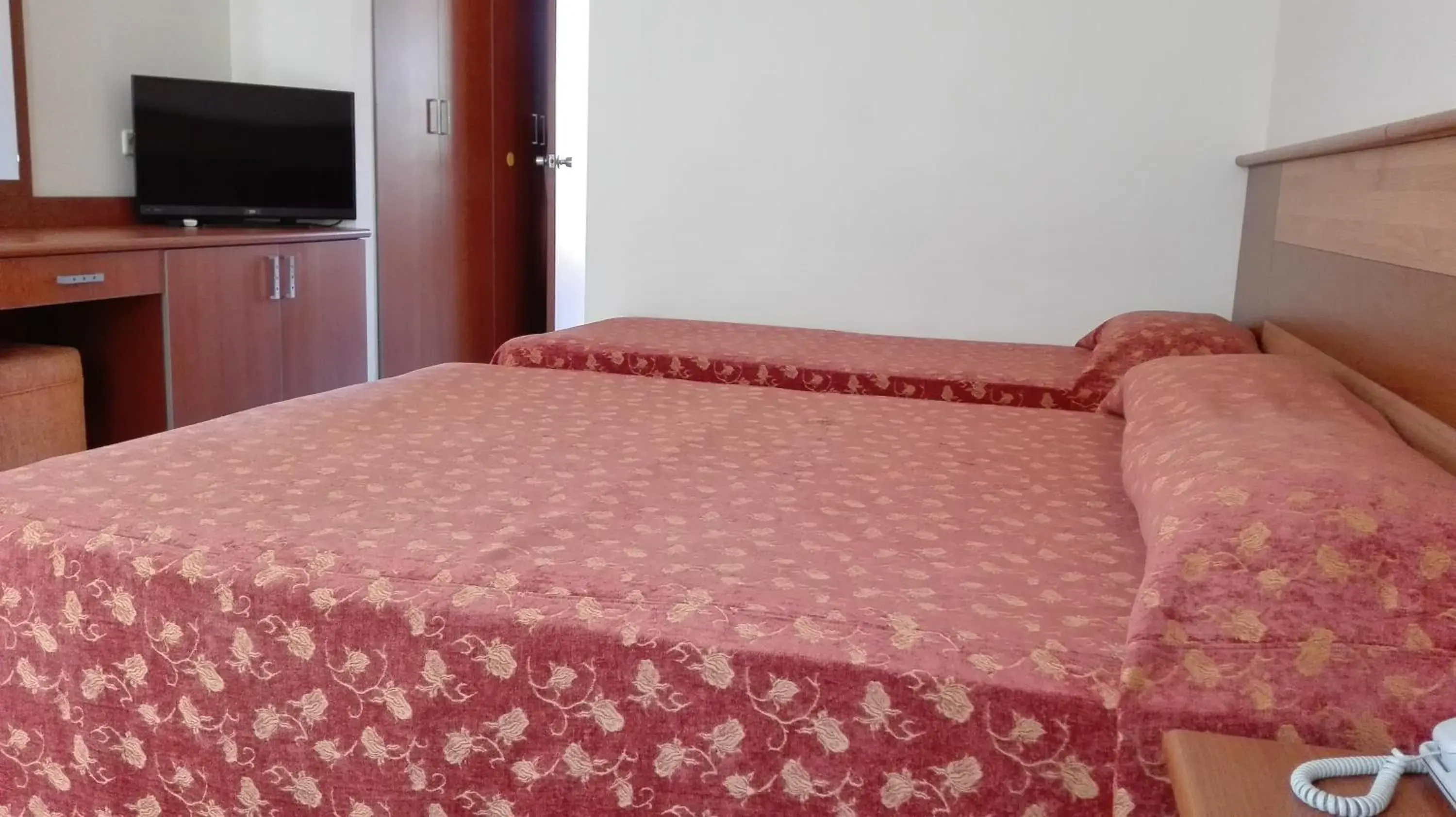 Bed in Mavruka Hotel