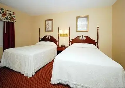 Bed in Ambassador Inn