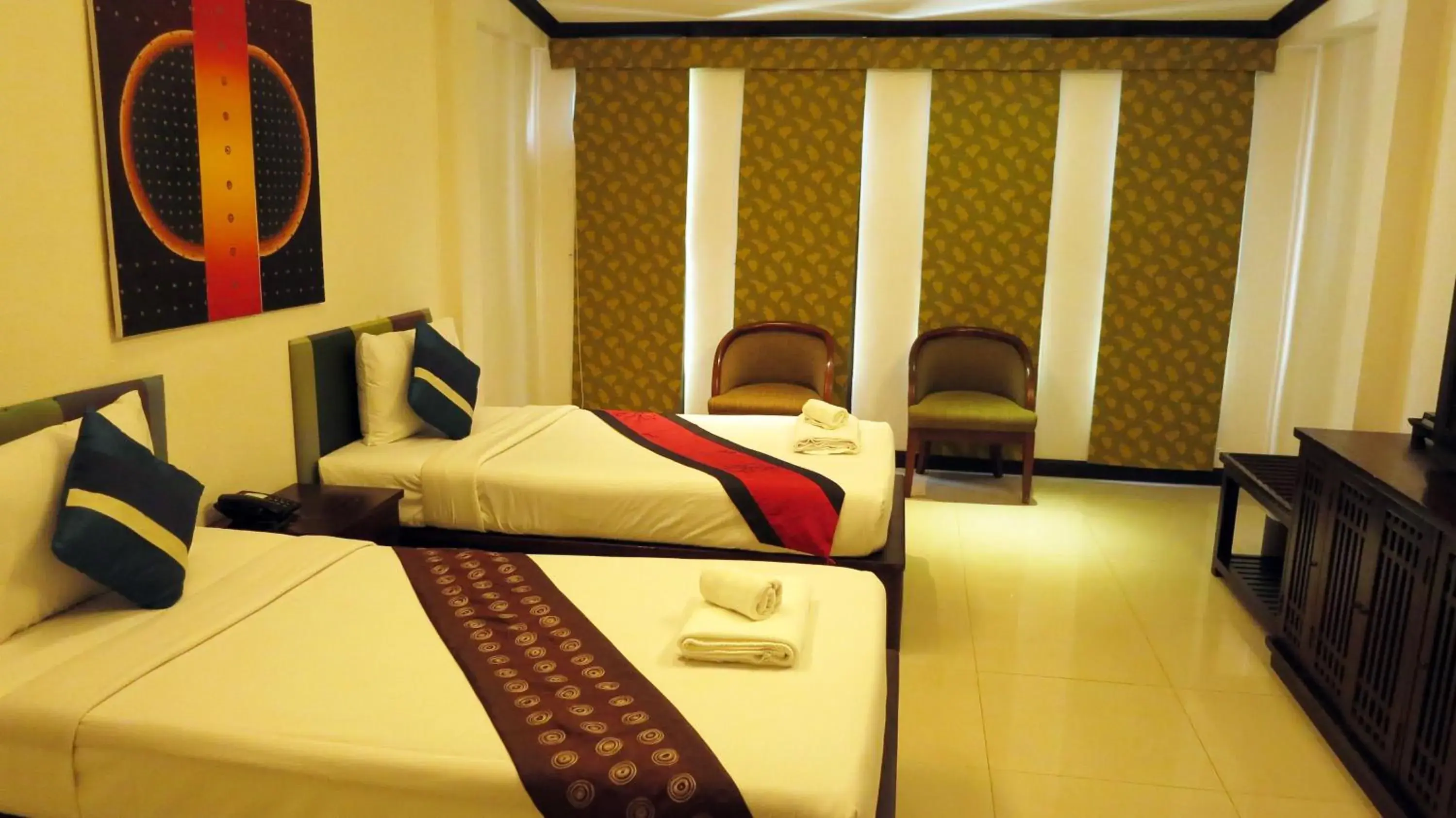 Bed in Queen Boutique Hotel