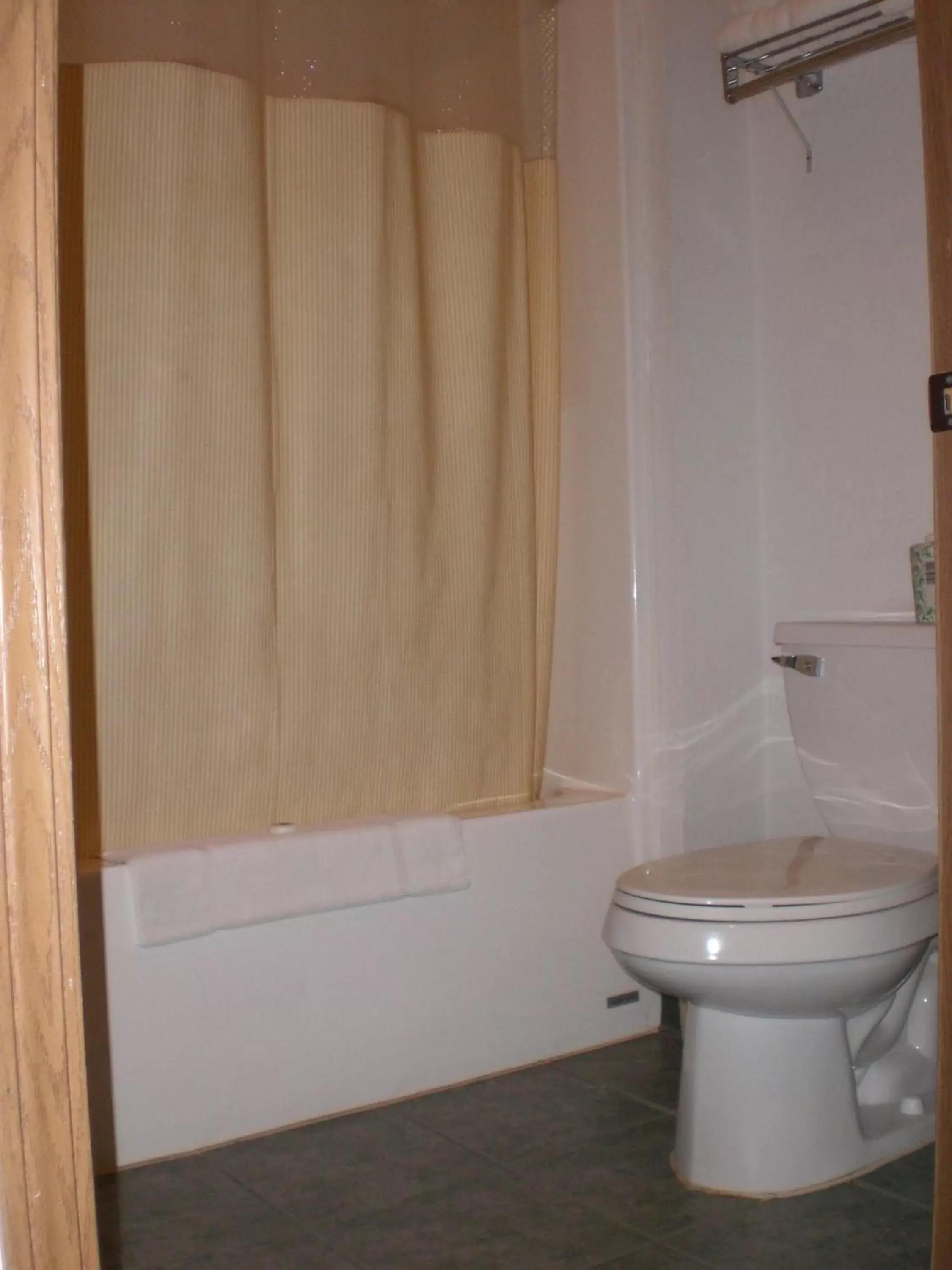 Toilet, Bathroom in Days Inn by Wyndham Butler