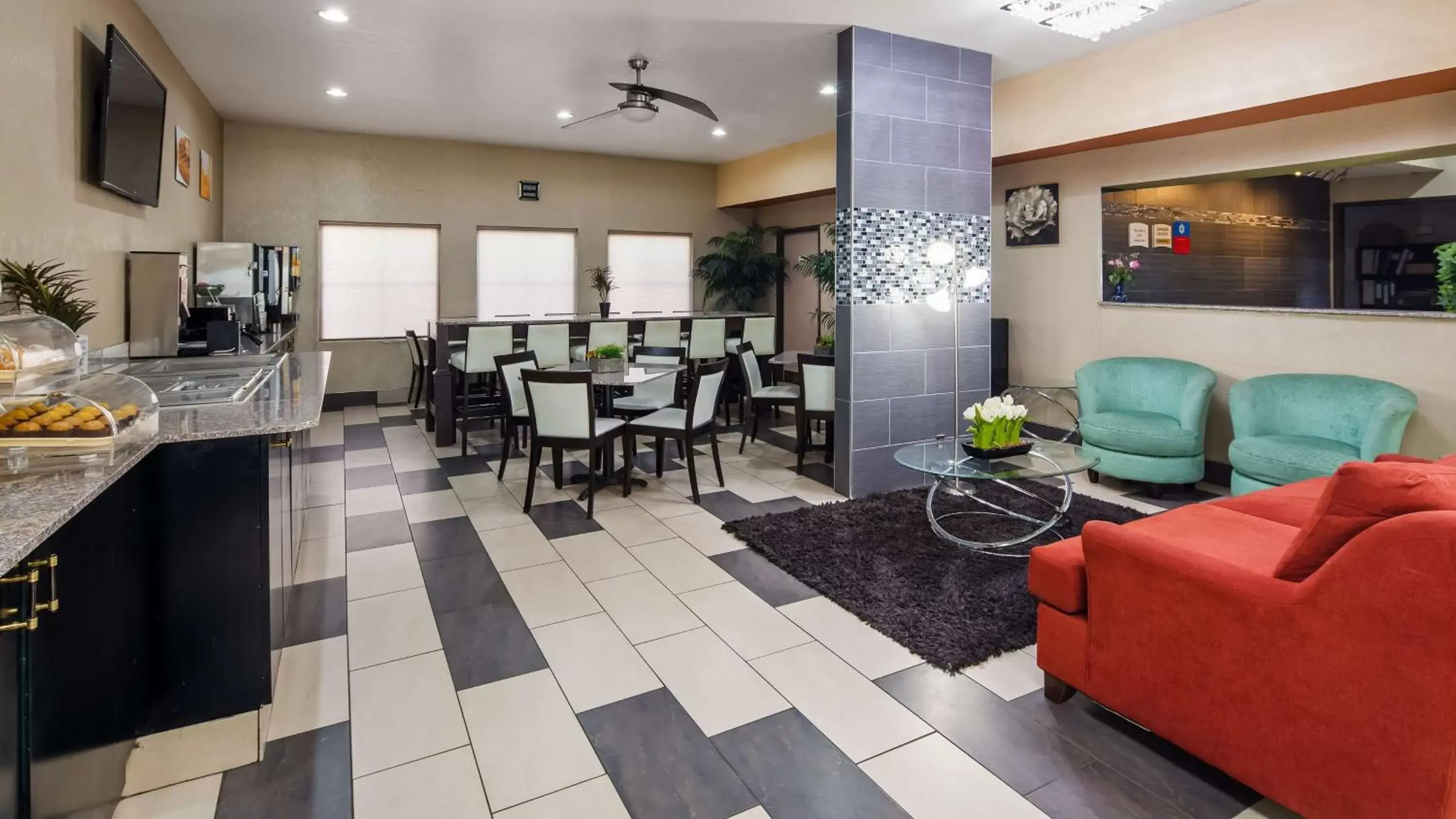 Lobby or reception in SureStay Plus Hotel by Best Western Blue Springs