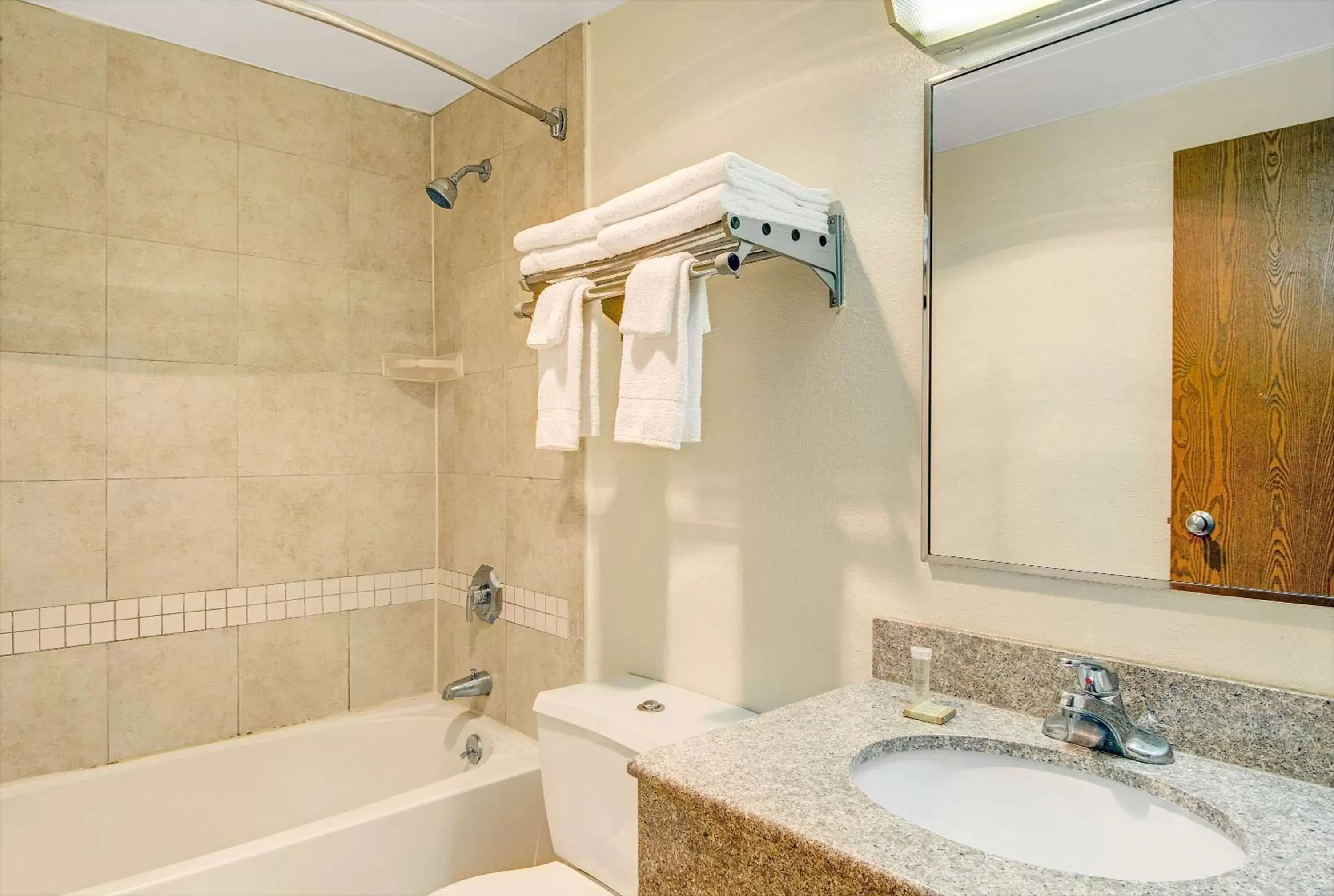 Bathroom in Super 8 by Wyndham Stamford/New York City Area