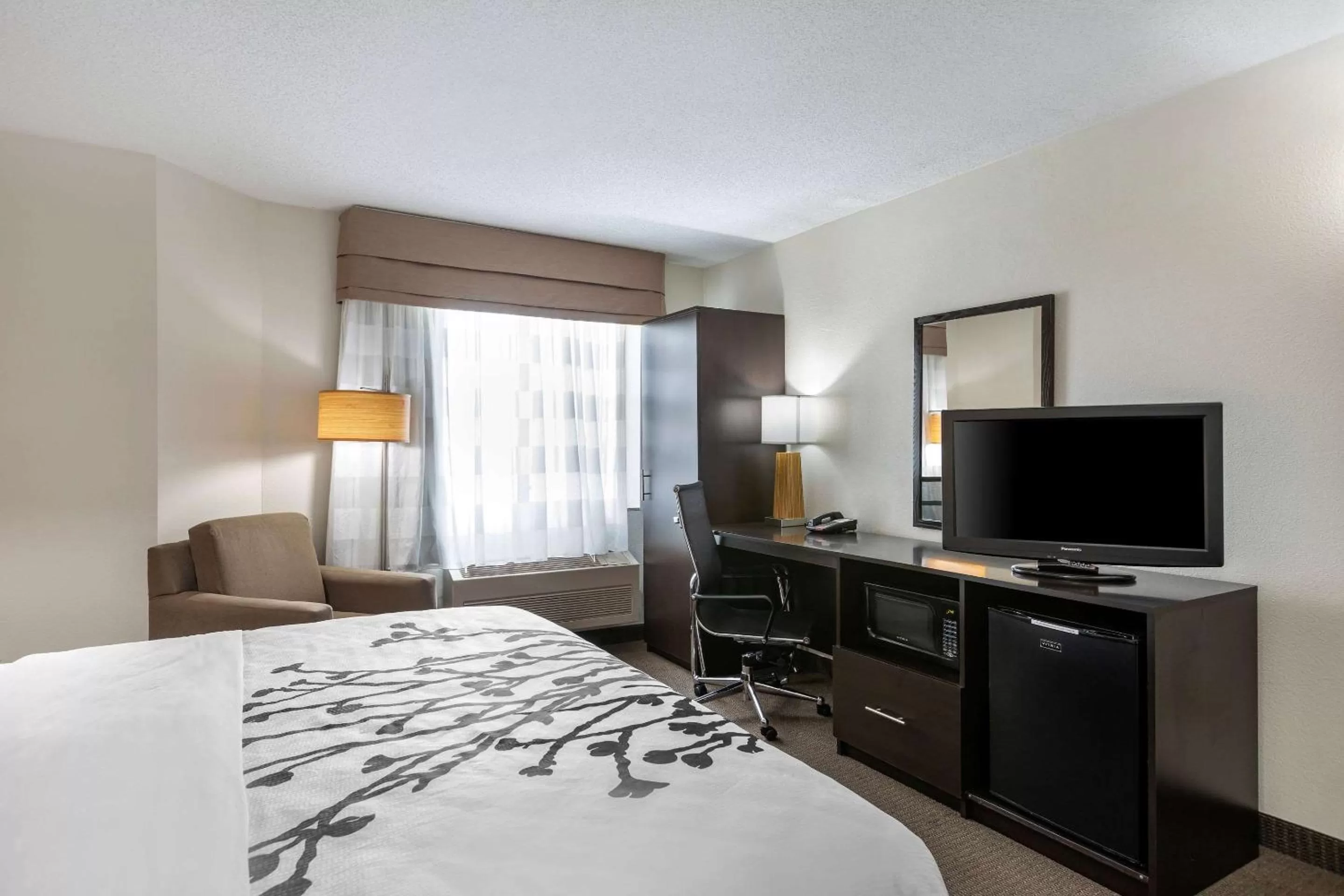 Photo of the whole room, Bed in Sleep Inn DeWitt - Lansing North