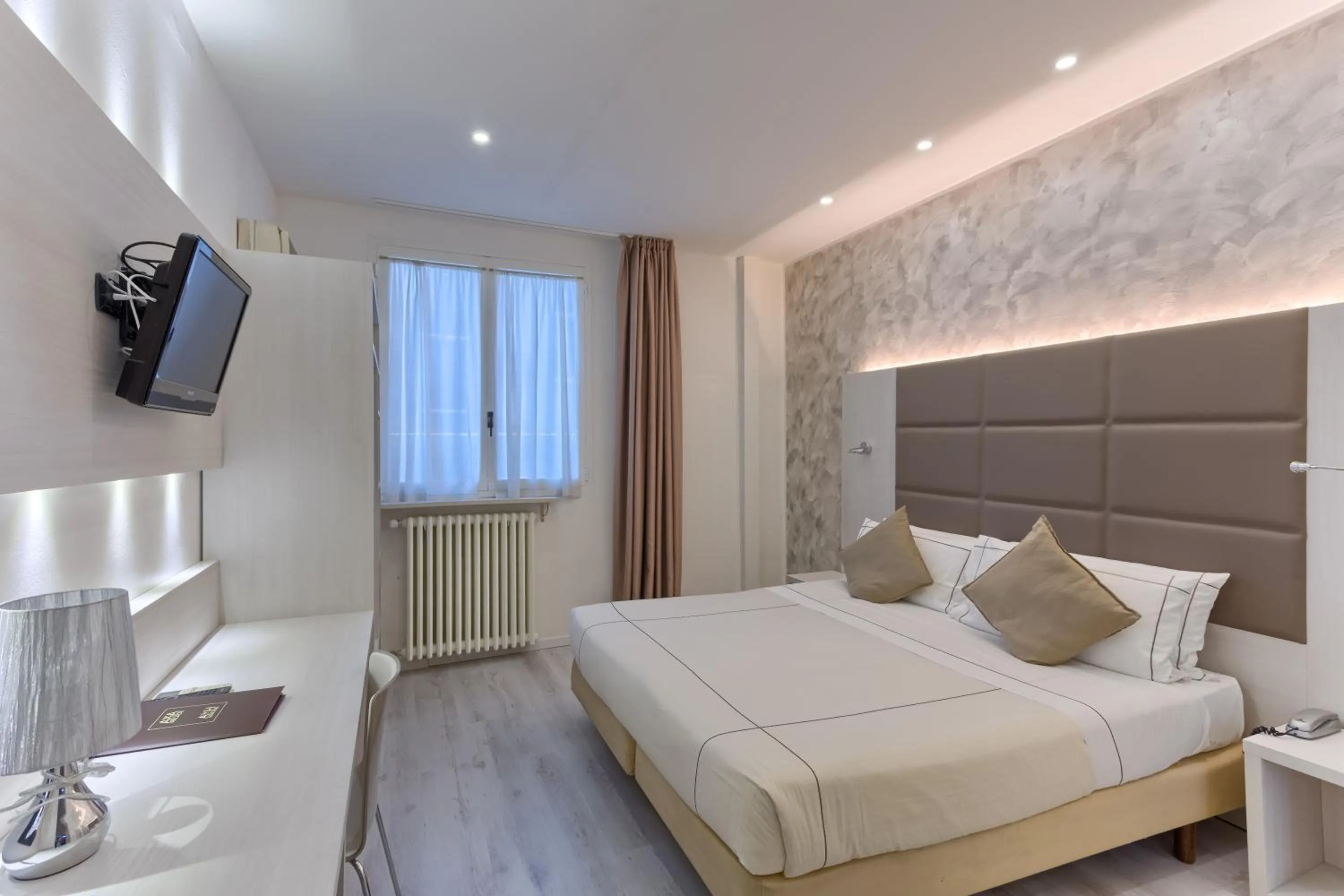 Photo of the whole room, Bed in Agape Hotel AA Hotels