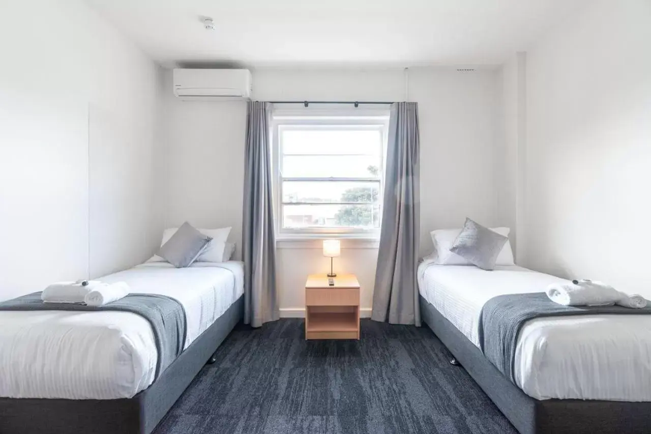 Bed in Sydney Junction Hotel