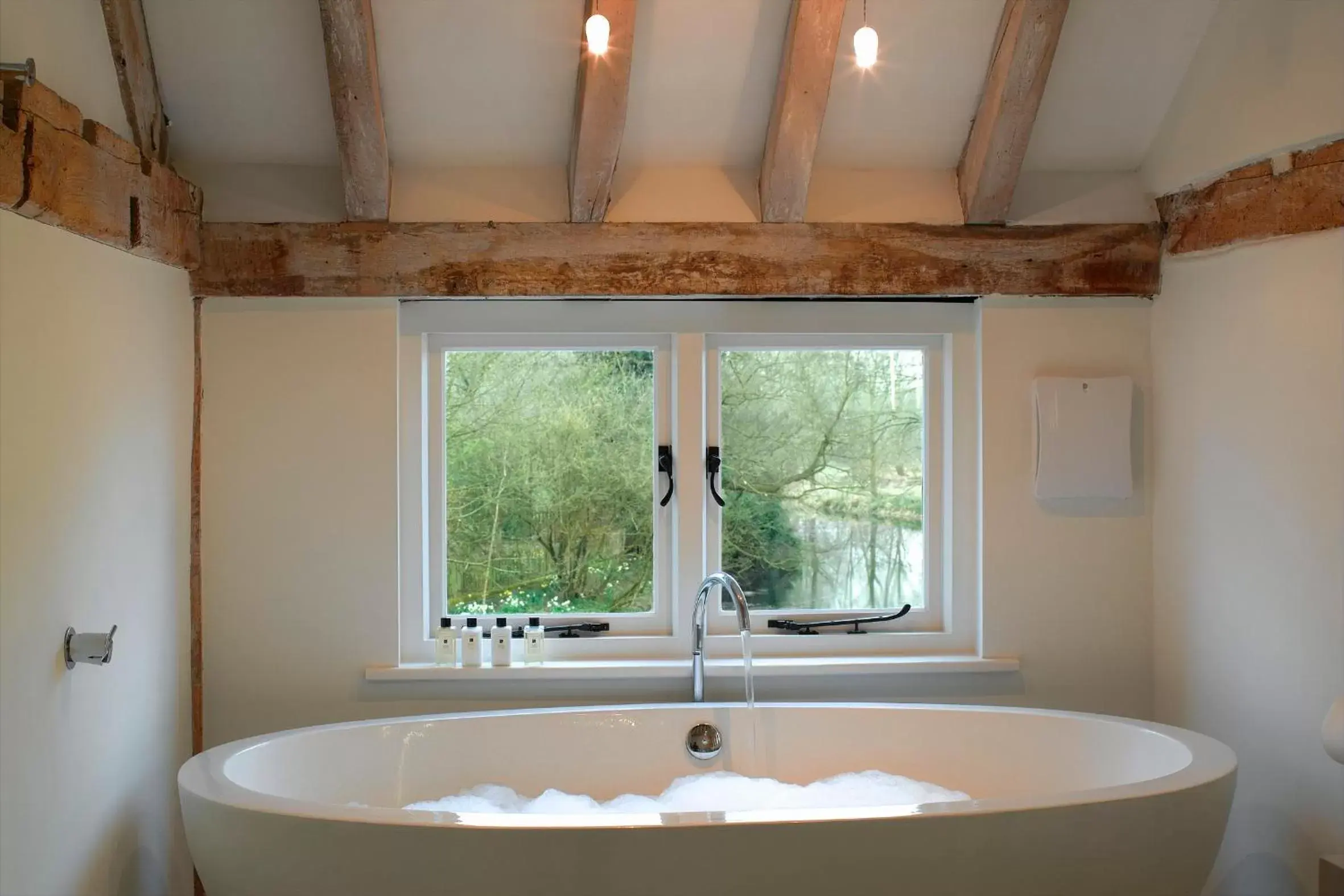 Bathroom in Tuddenham Mill Luxury Hotel