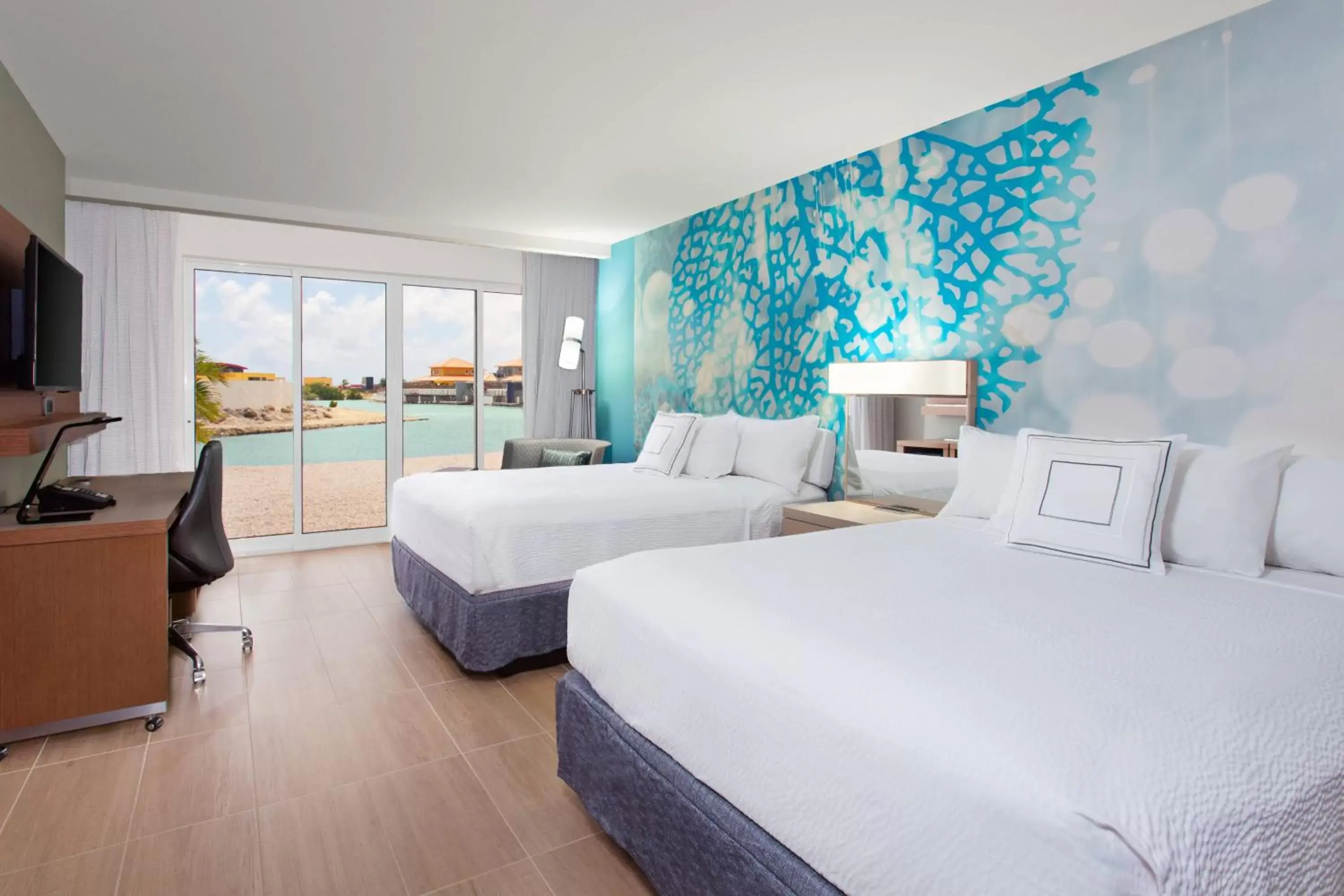 Photo of the whole room, Bed in Courtyard by Marriott Bonaire Dive Resort