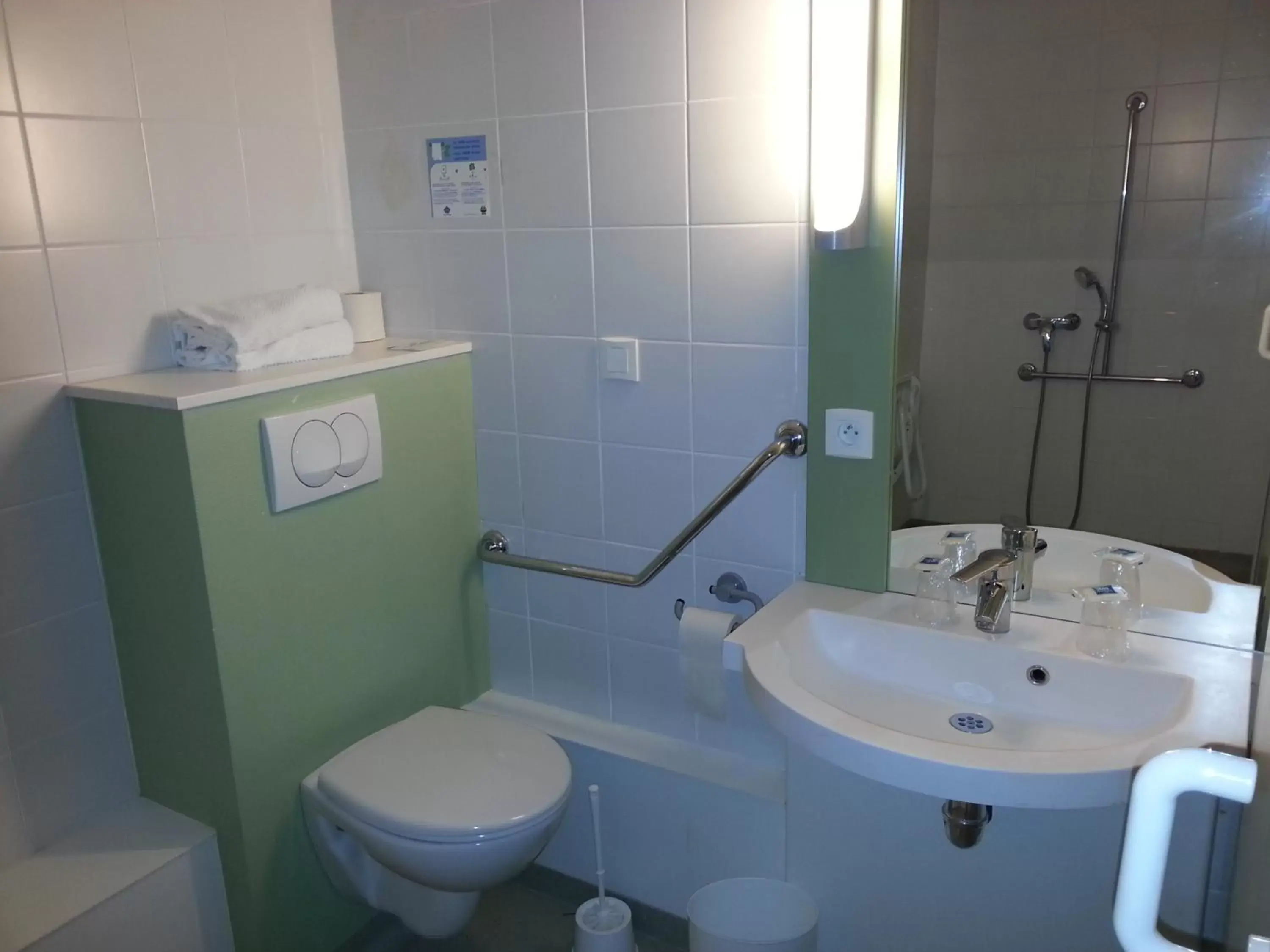 Toilet, Bathroom in ibis budget Nantes Ouest