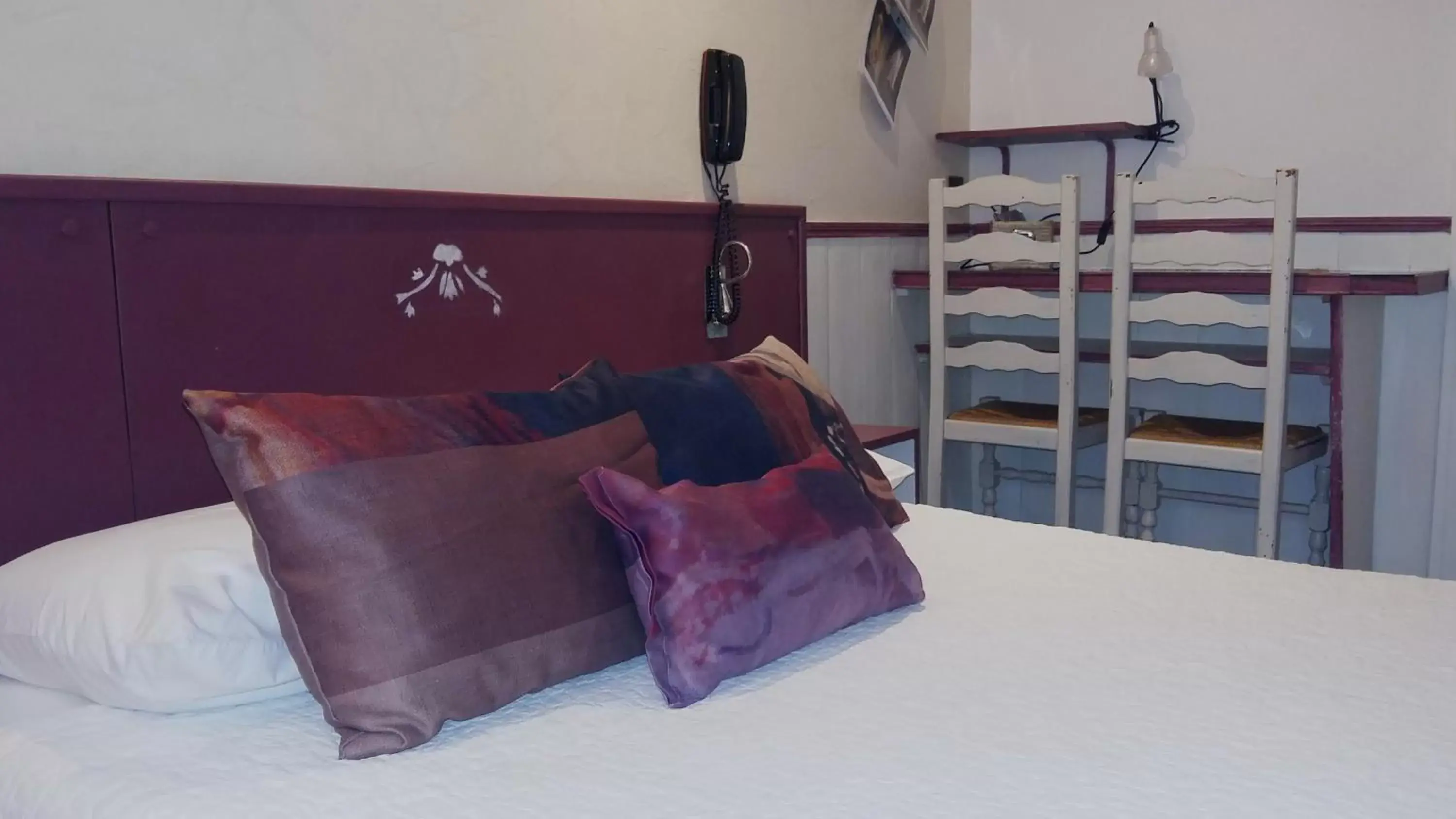 Bed in Hotel Mignon Bed in Hotel Mignon