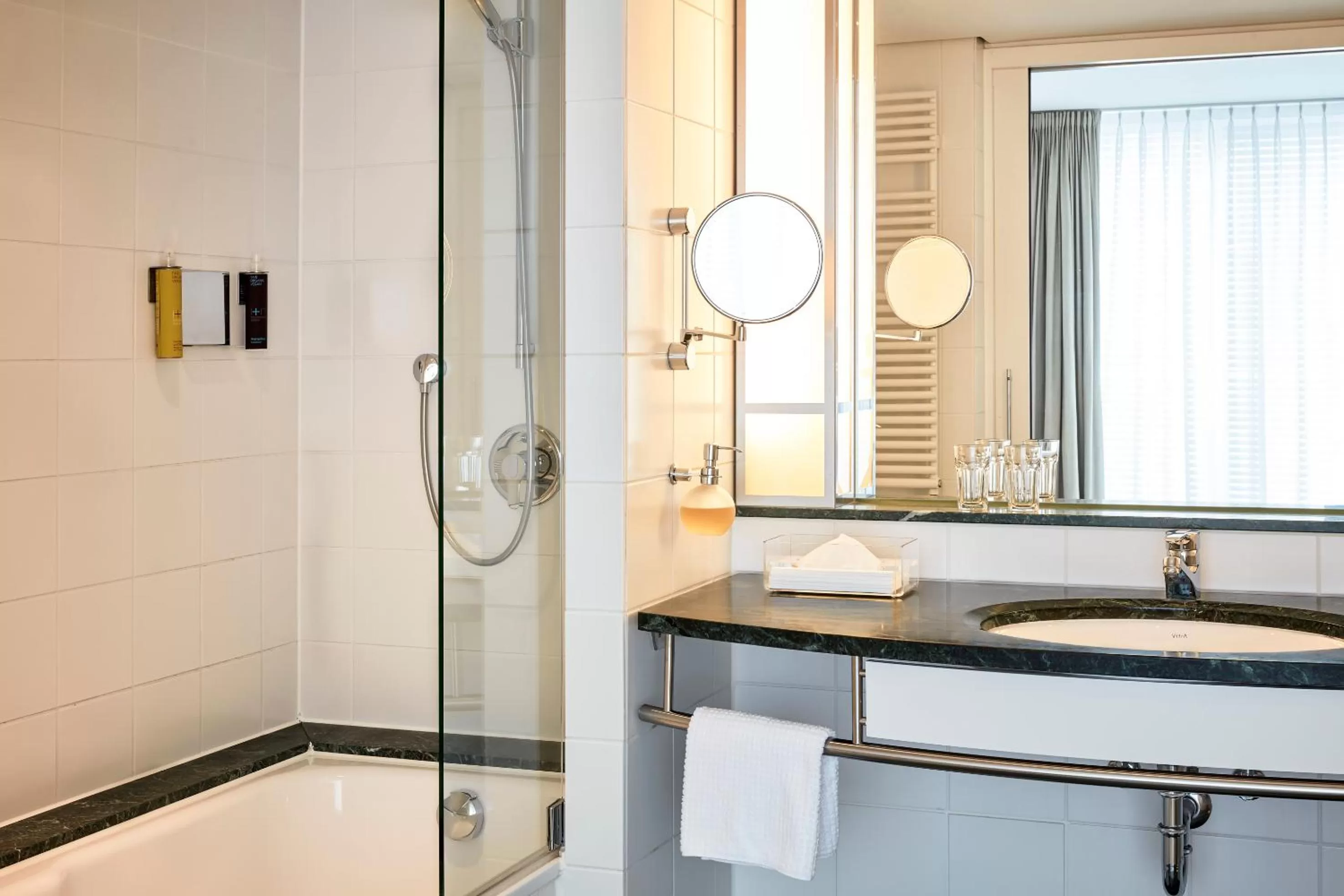 Shower in The Mandala Berlin, a Member of Design Hotels