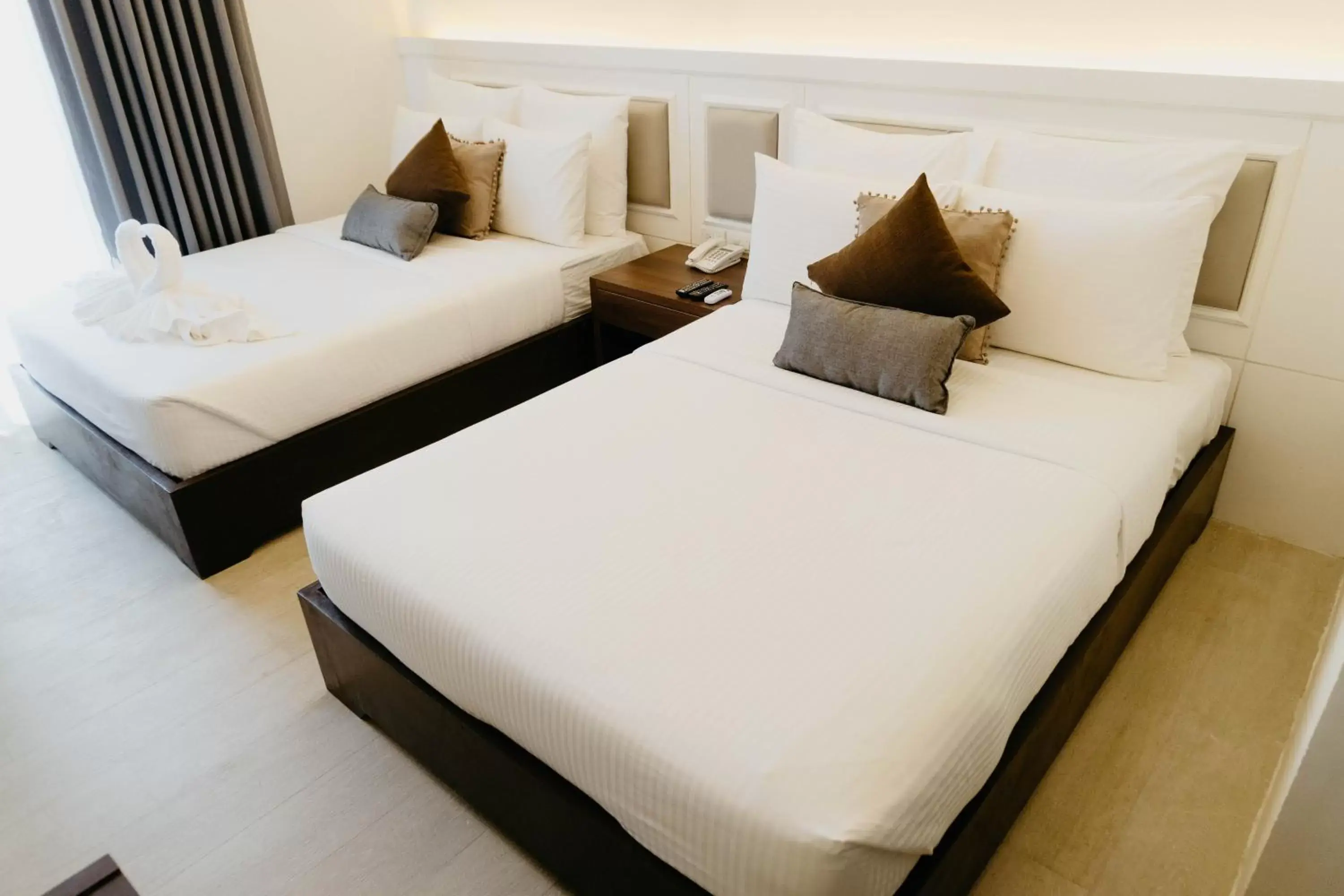 Bed in Sotogrande Iloilo Hotel