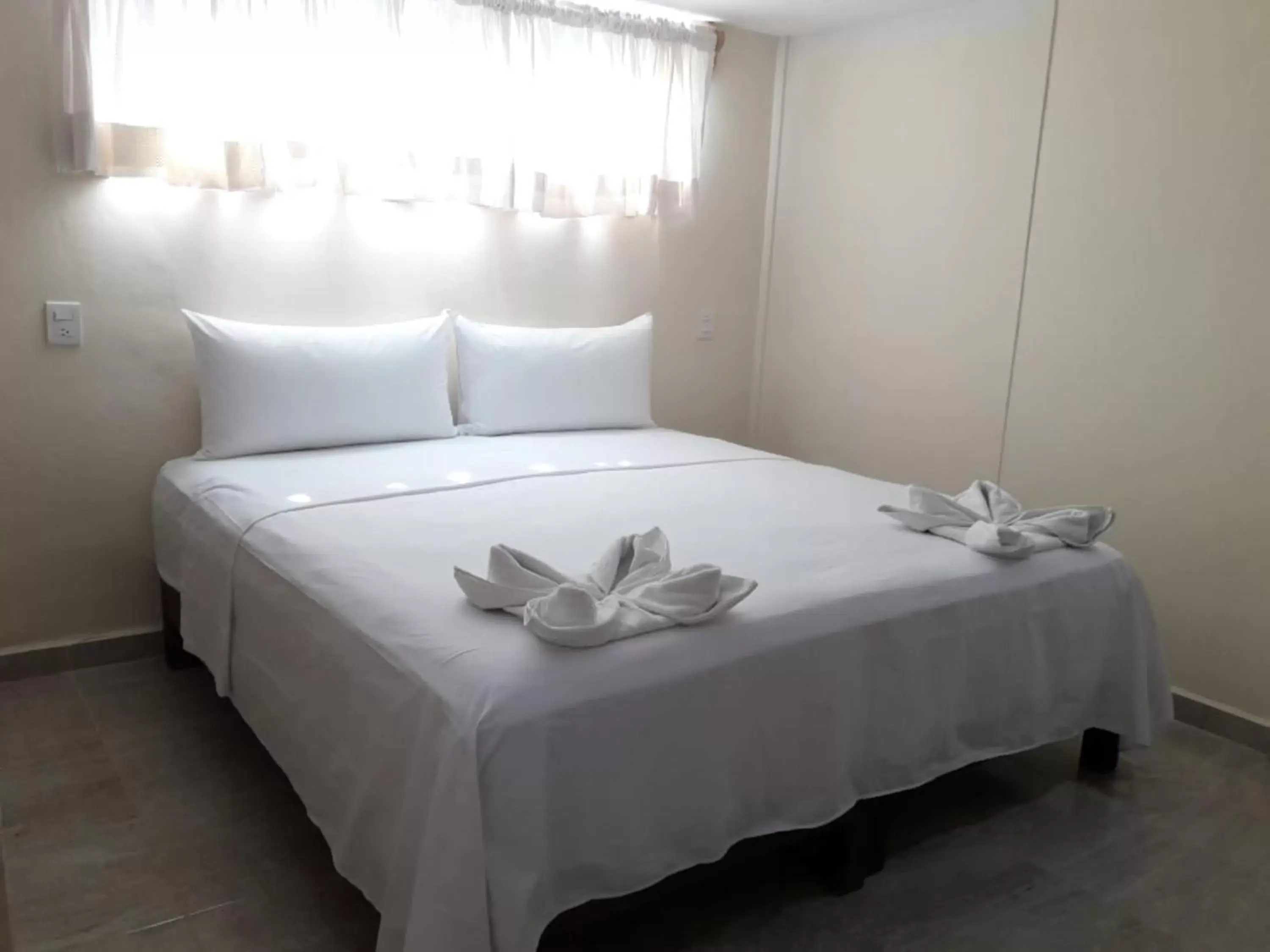 Bed in Hotel Ashly Loma Larga