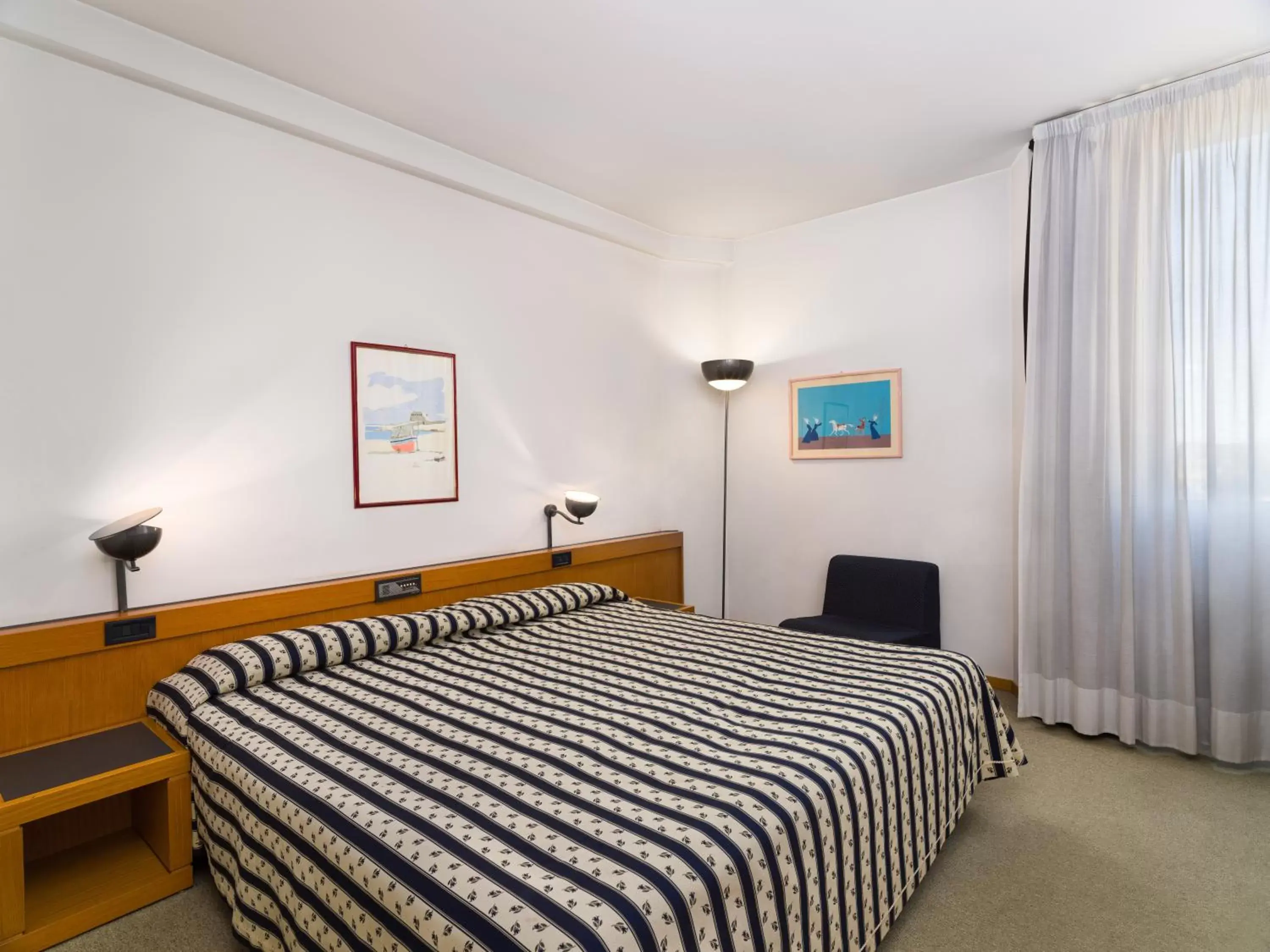 Bed in Grand Hotel Tiziano E Dei Congressi