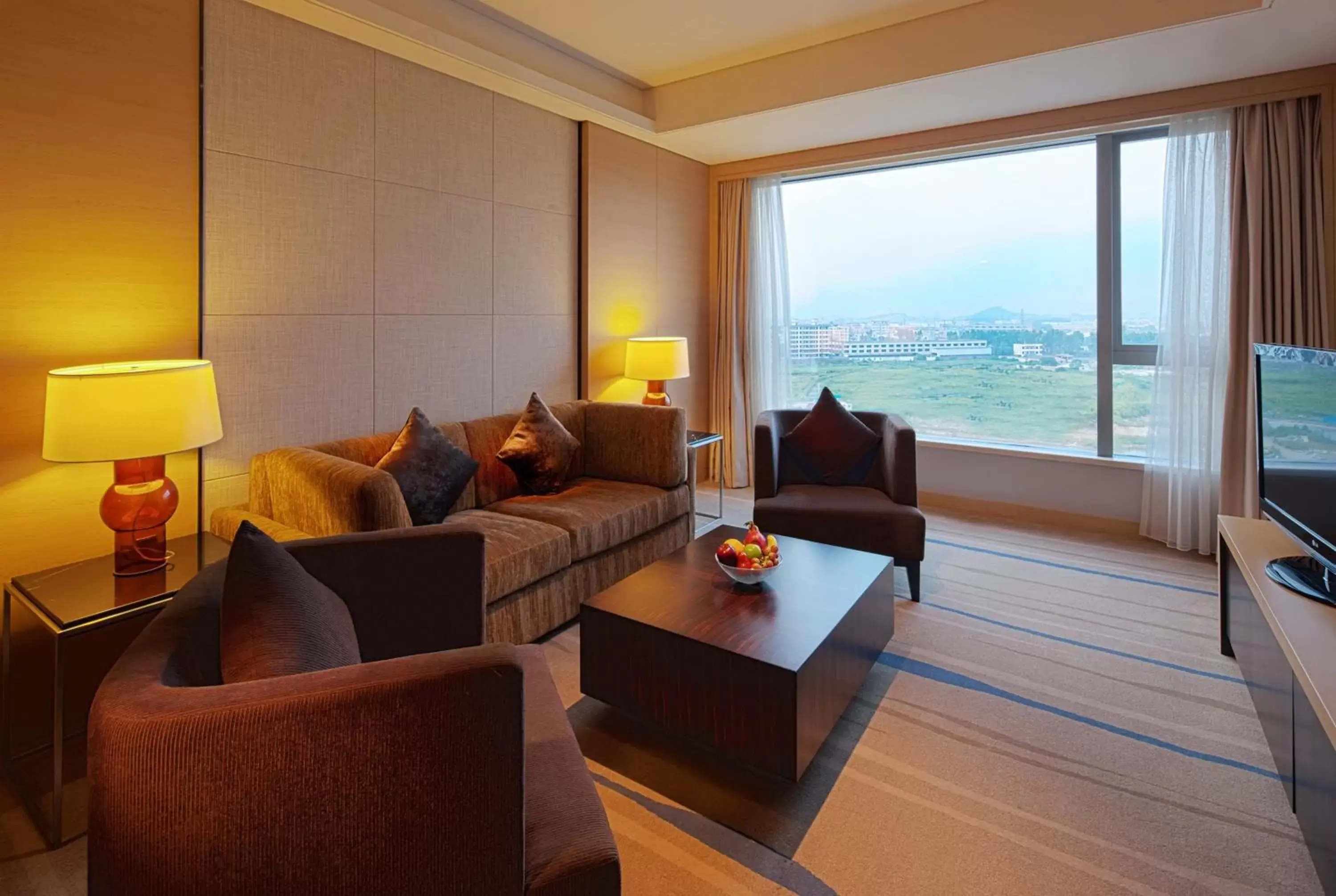 Photo of the whole room, Seating Area in Crowne Plaza Guangzhou Huadu, an IHG Hotel