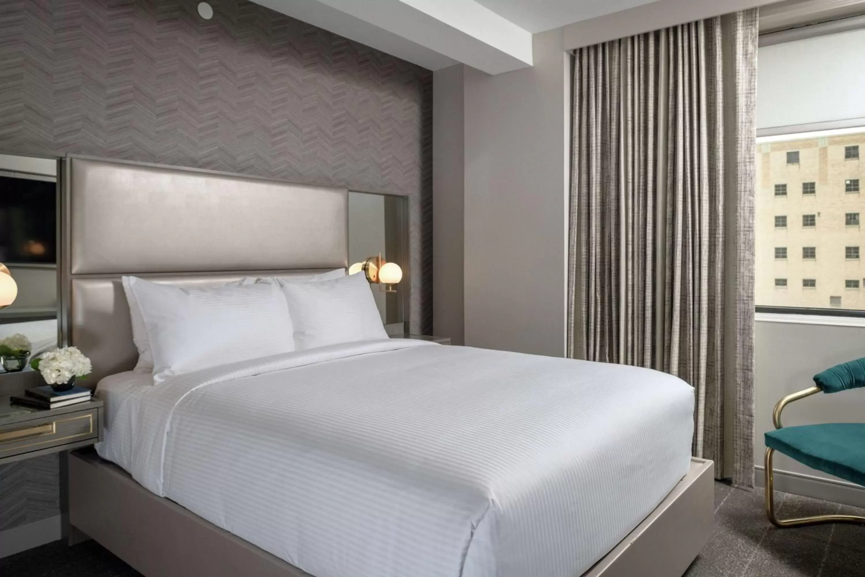 Bed in Tulsa Club Hotel Curio Collection By Hilton