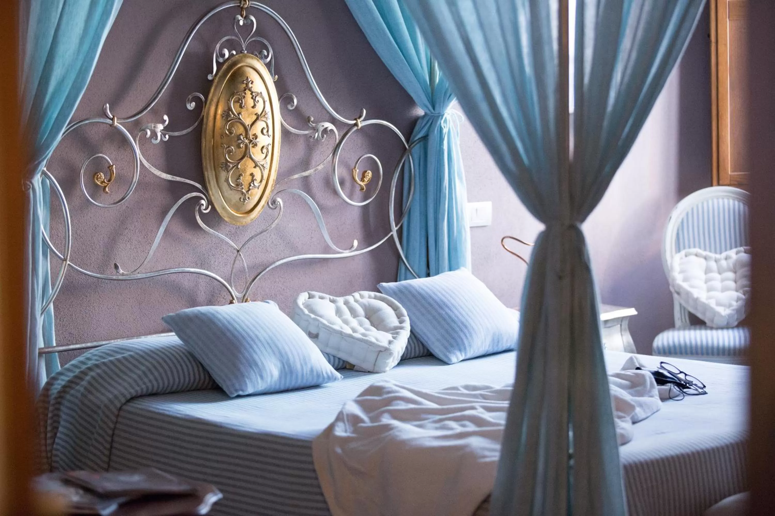 Bed in PALAZZO DEL CAPITANO Wellness & Relais - Luxury Borgo Capitano Collection