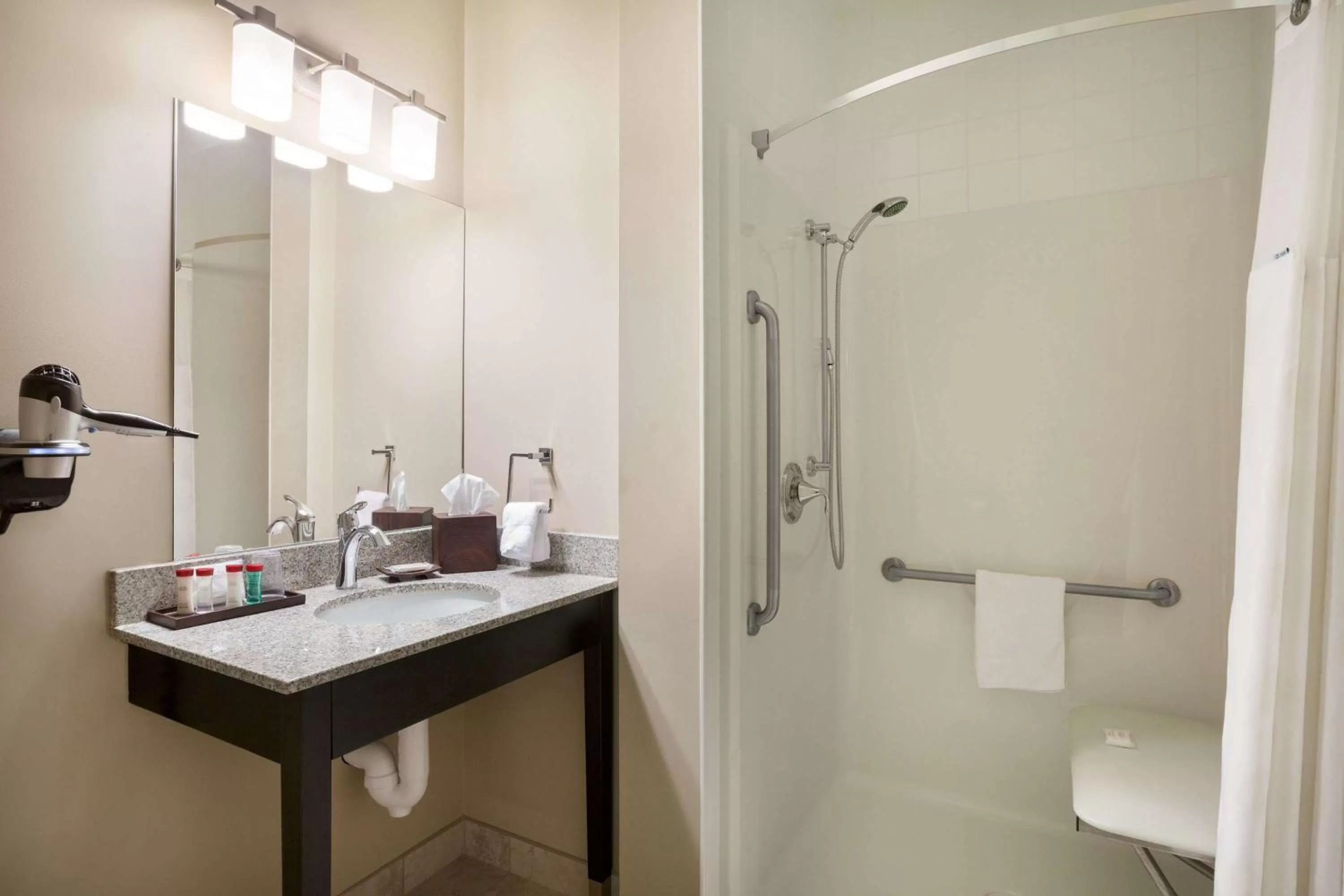 Bathroom in Ramada by Wyndham Emerald Park/Regina East