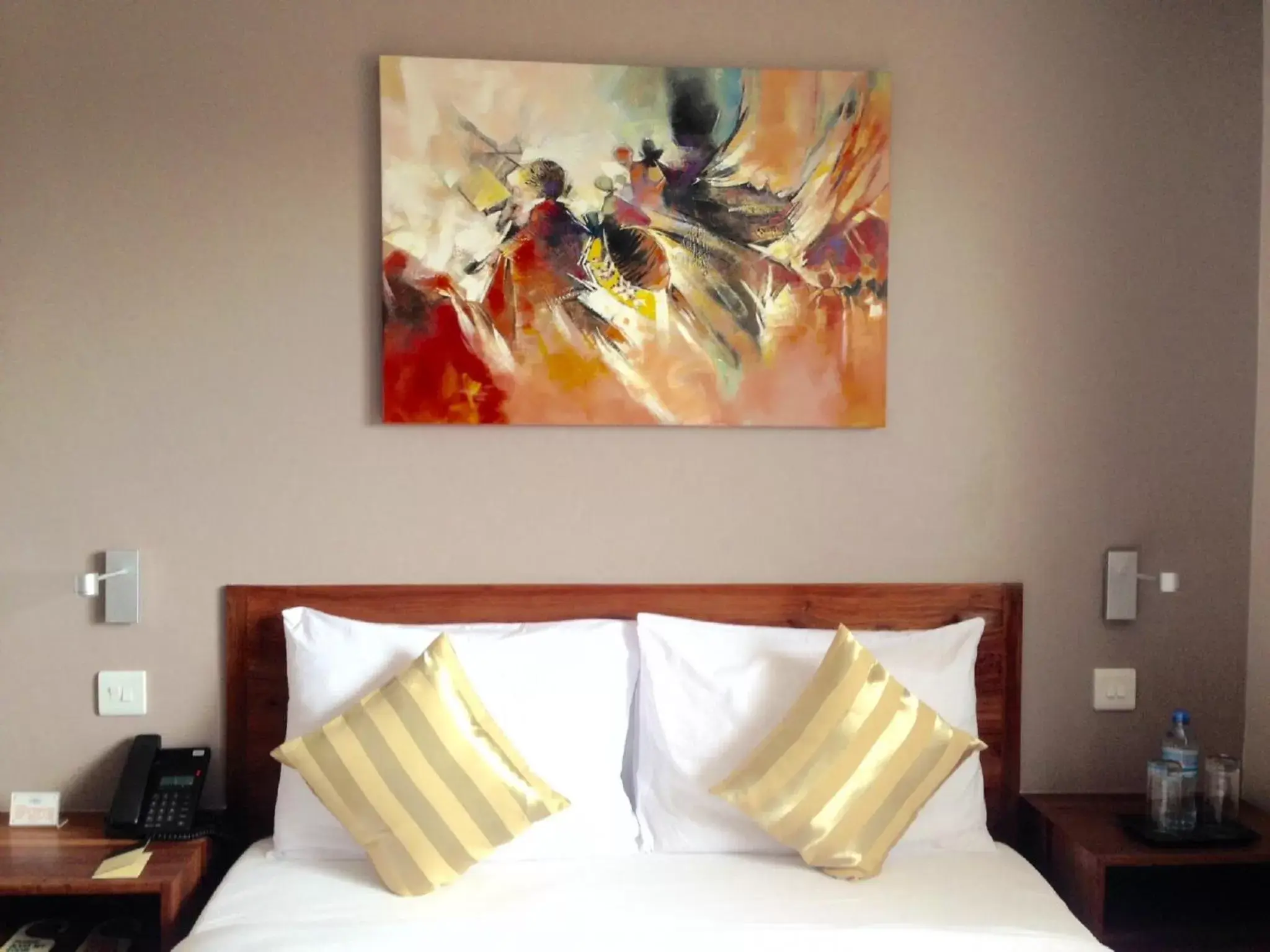 Bed in Venus Premier Hotel