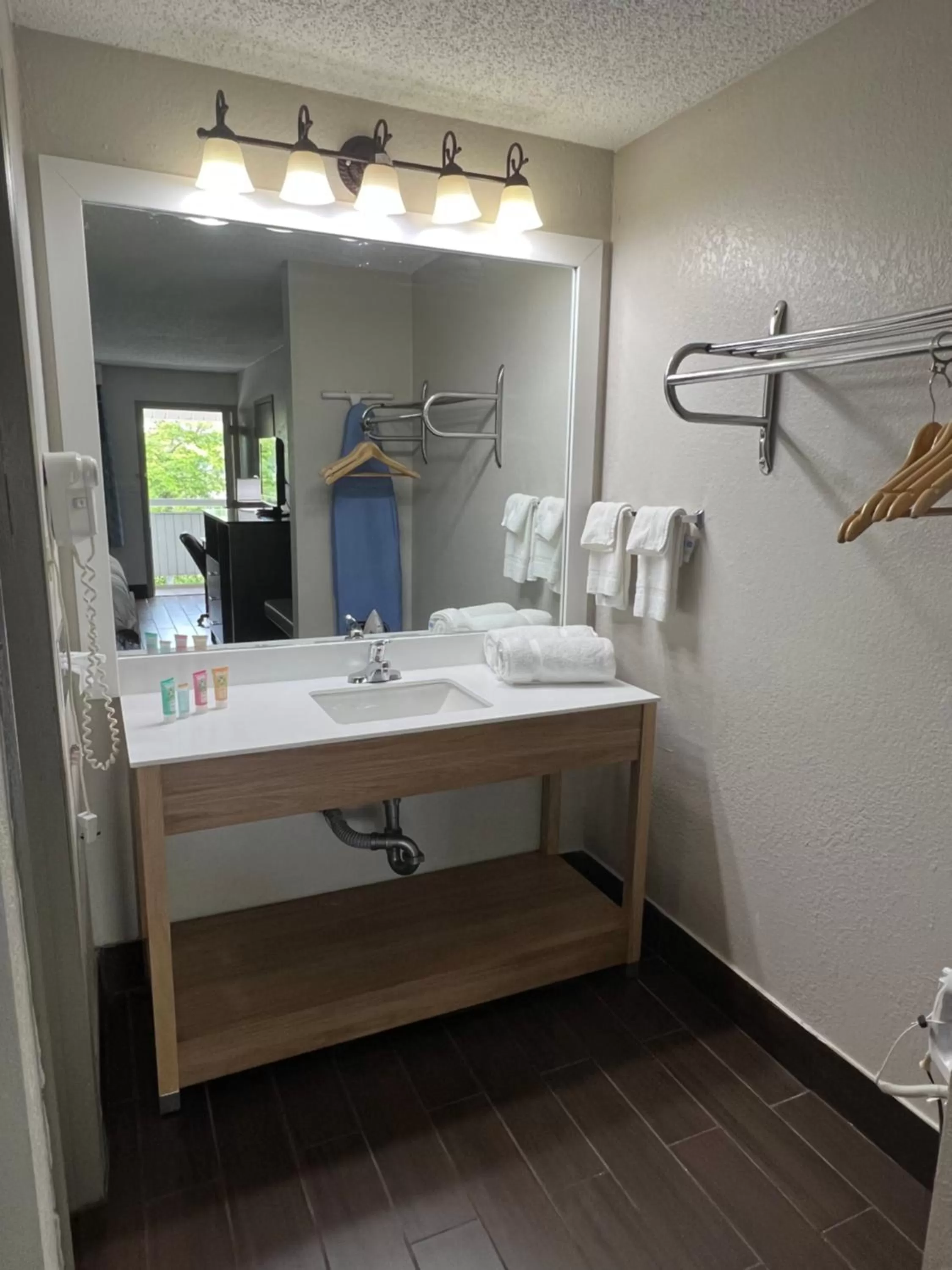 Bathroom, Bed in Days Inn & Suites by Wyndham Monroe