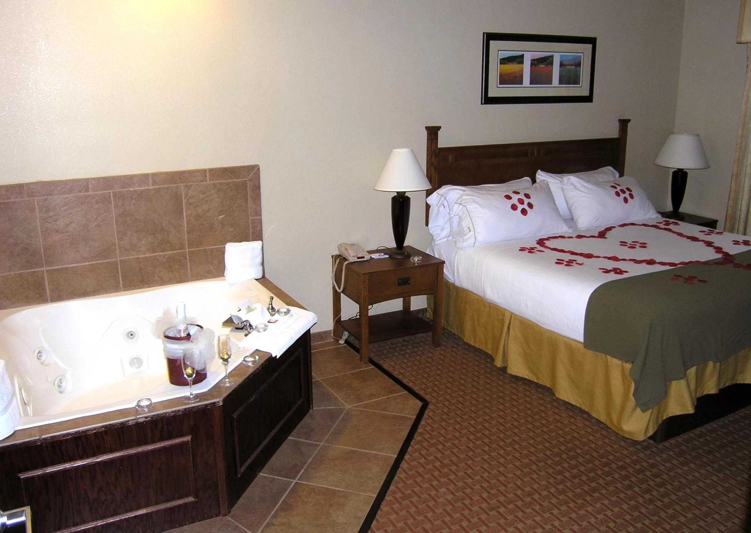 Bed in Baymont Inn & Suites by Wyndham Sturgis