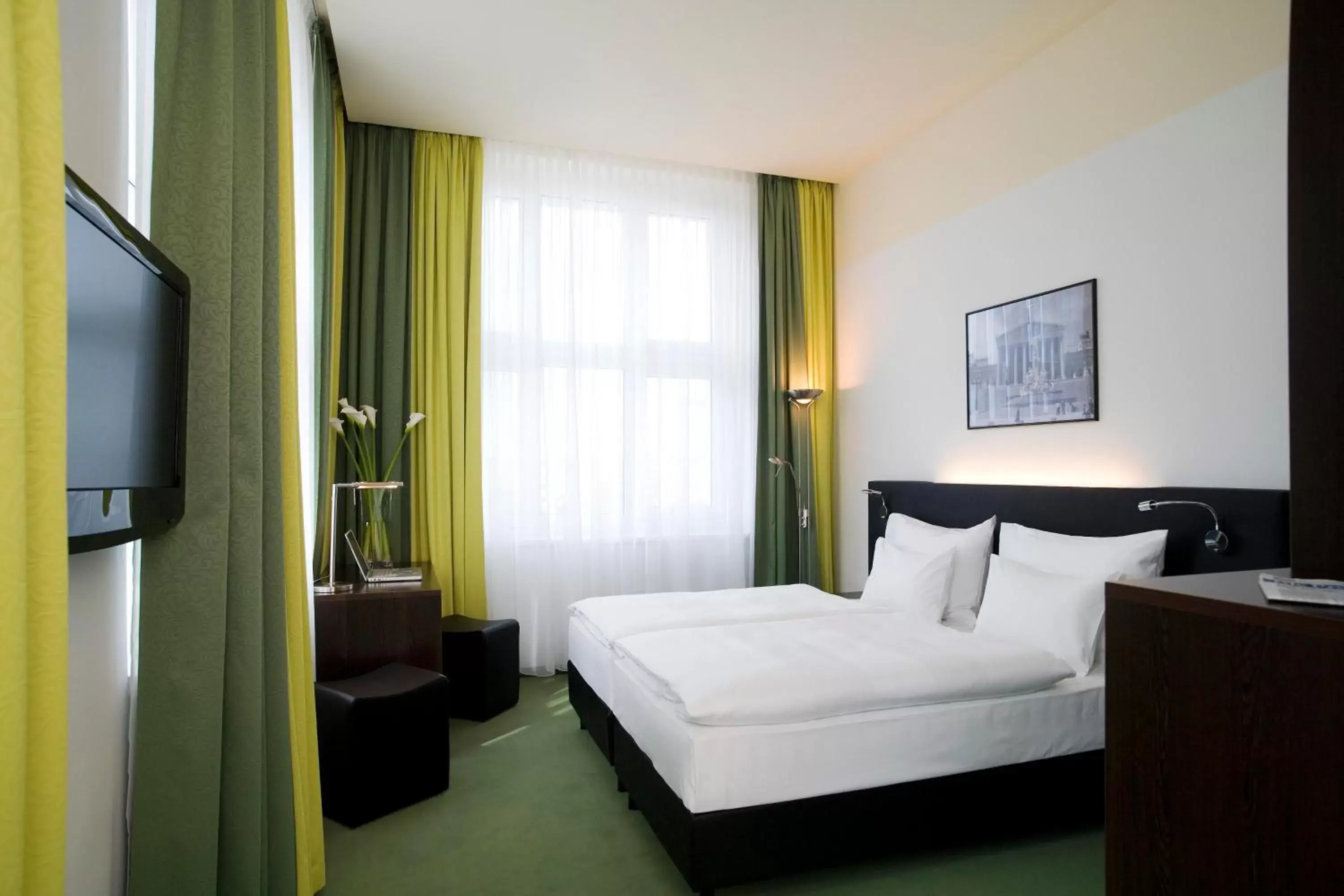Bed in Rainers Hotel Vienna