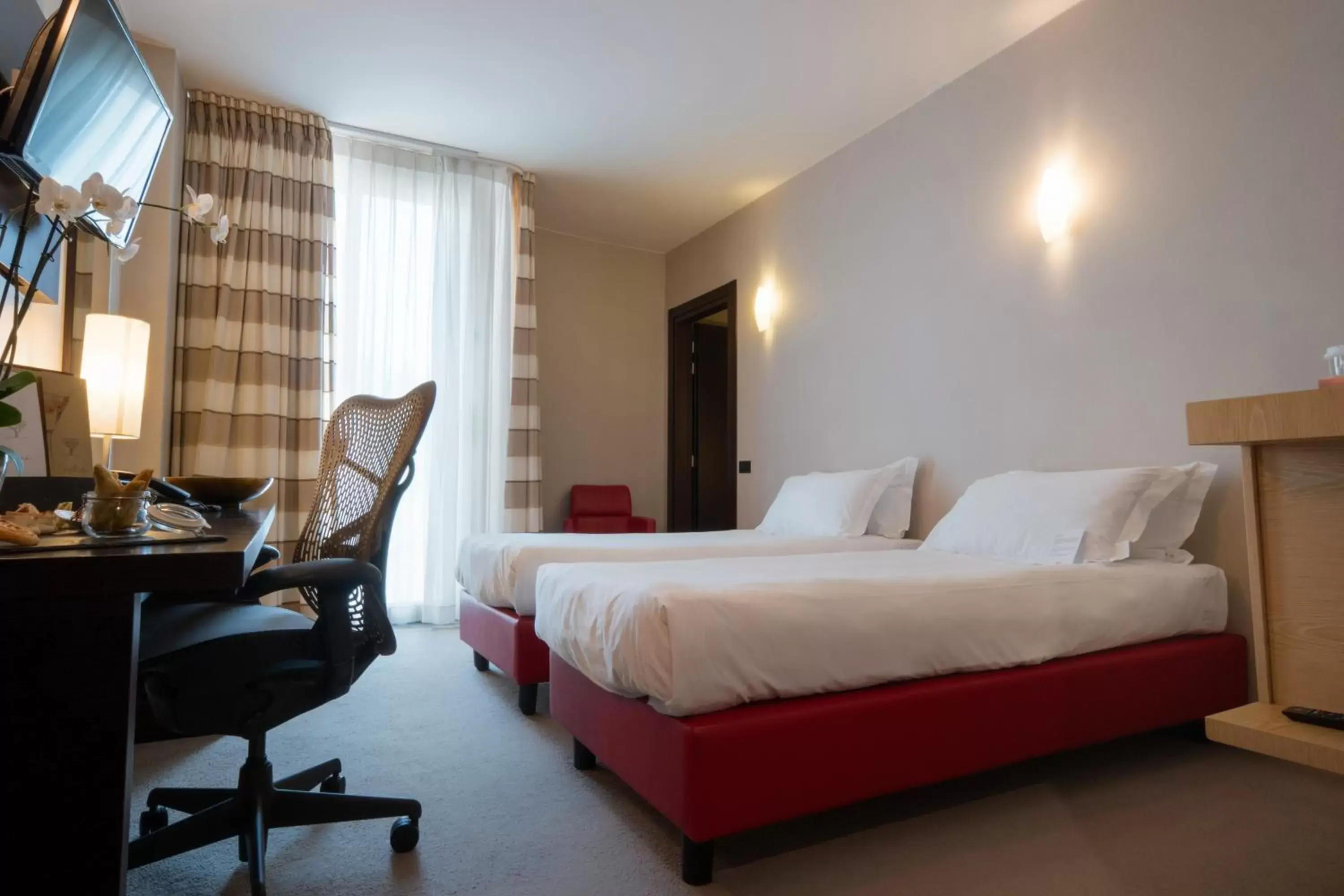 Bed in UNAHOTELS MH Matera