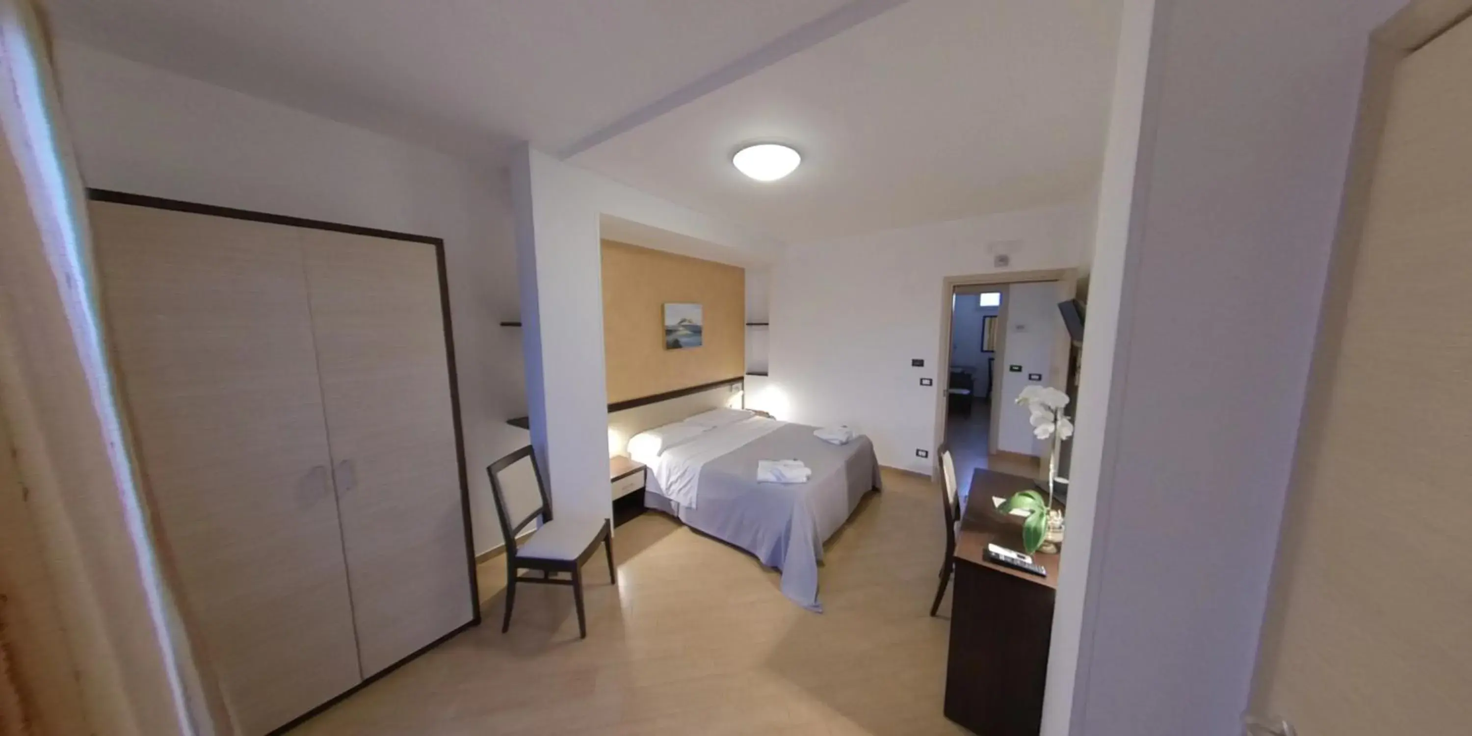 Bed in Albergo Perseo