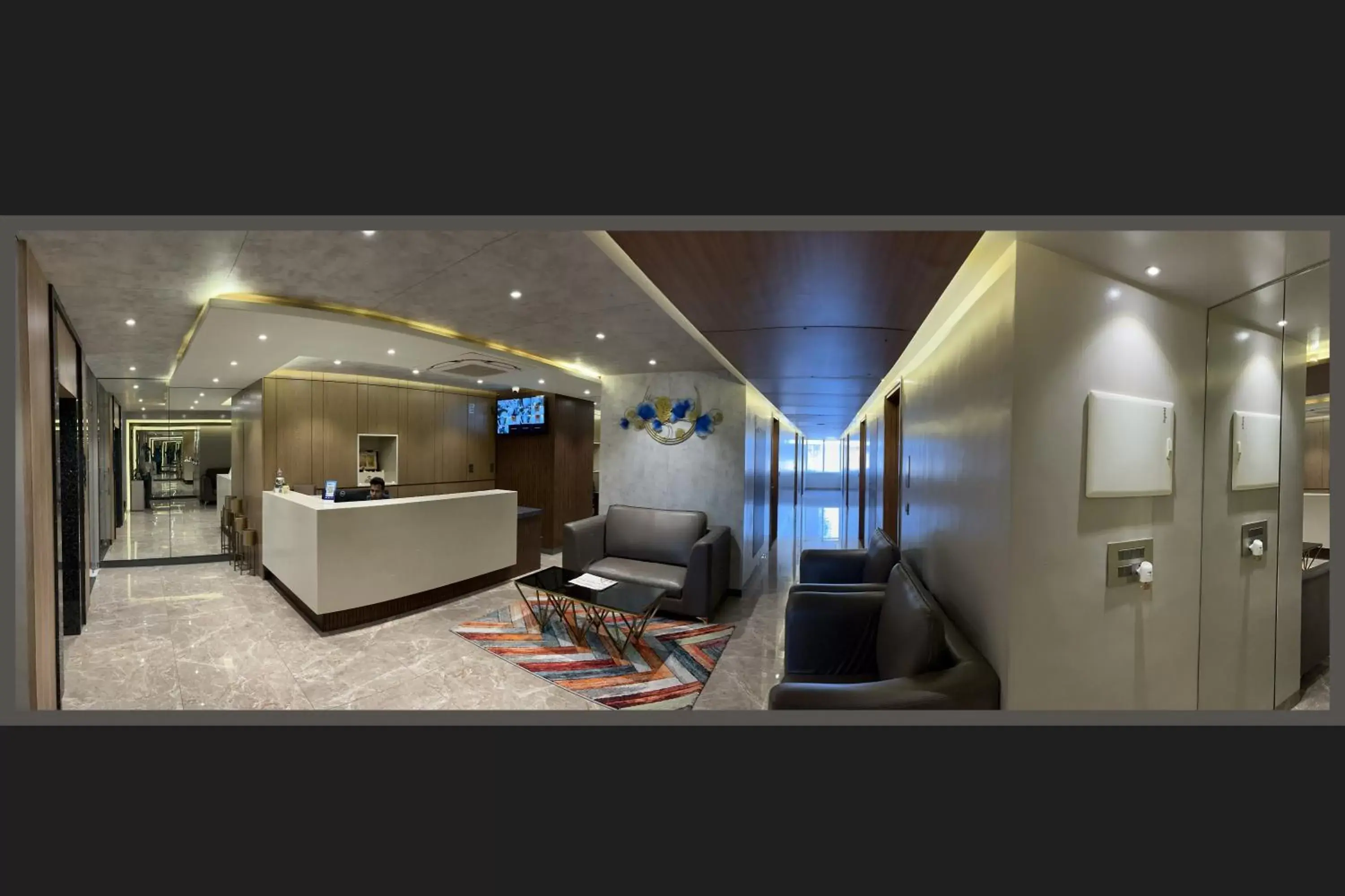 Lobby or reception in Symphony Inn Lobby or reception in Symphony Inn