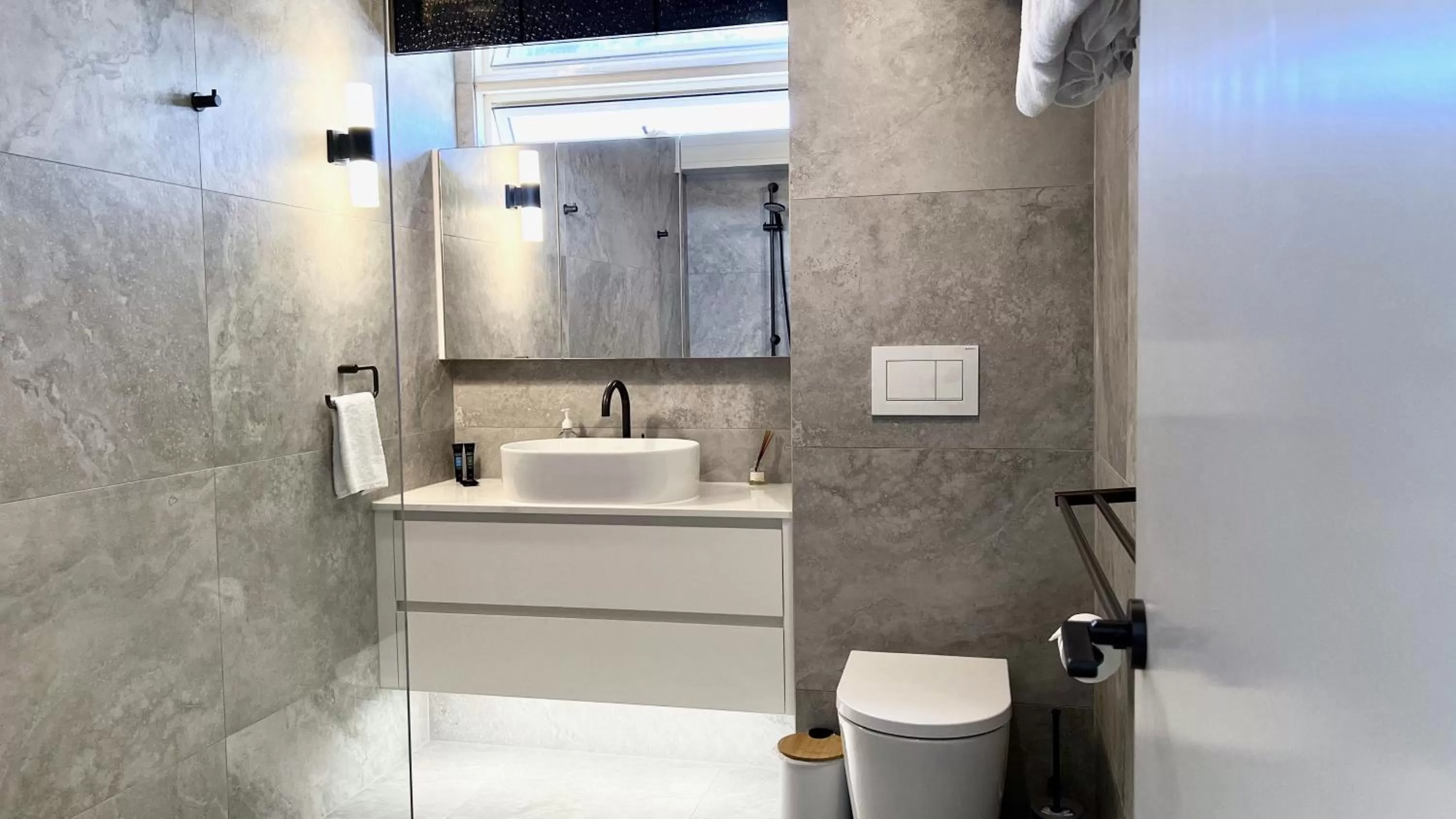 Shower in 84 The Spit Holiday Apartments