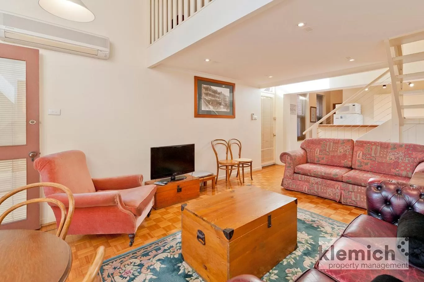 Communal lounge/ TV room in North Adelaide Heritage Cottages & Apartments