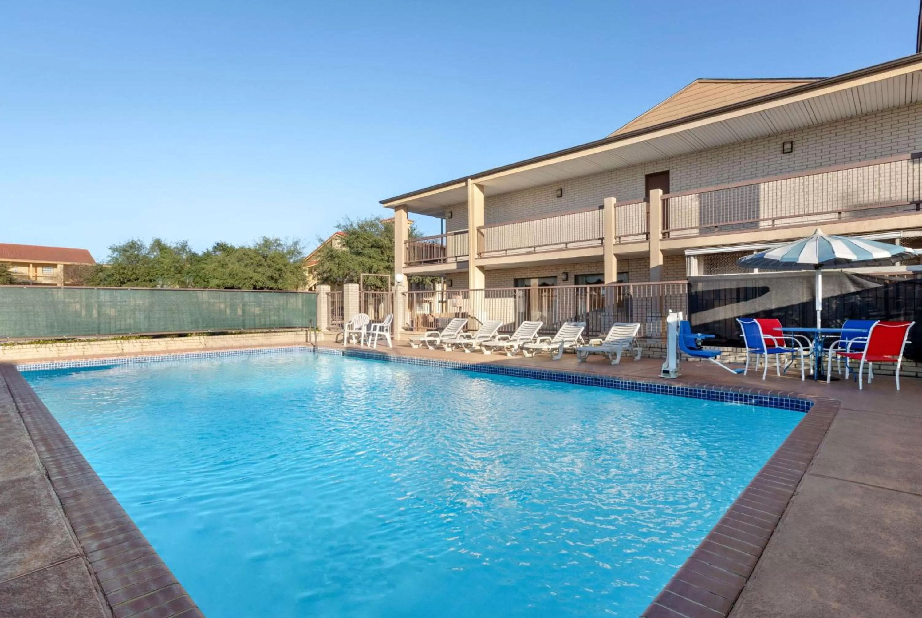 Swimming pool in Ramada by Wyndham San Antonio Near SeaWorld - Lackland AFB