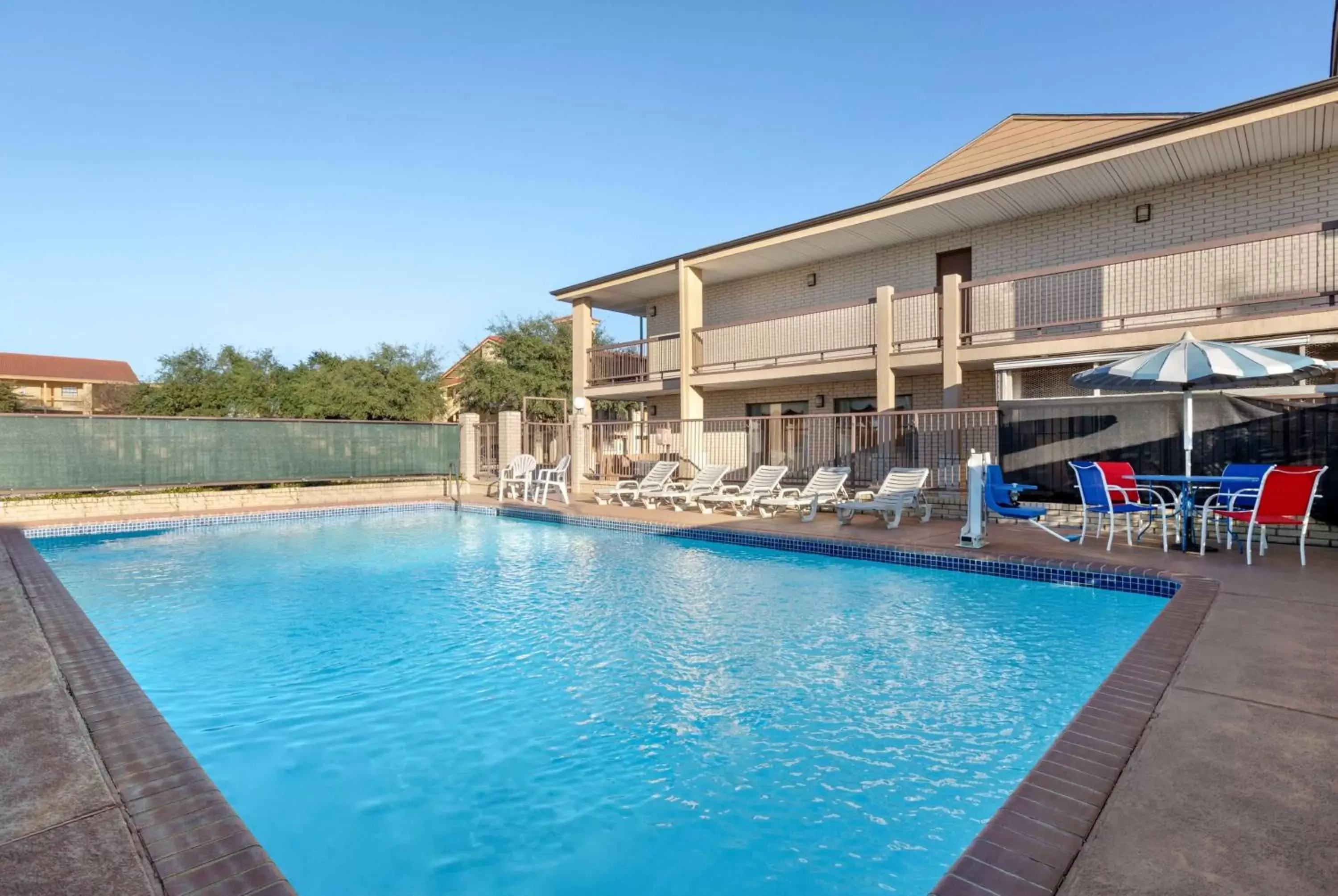 Swimming Pool in Ramada by Wyndham San Antonio Near SeaWorld - Lackland AFB