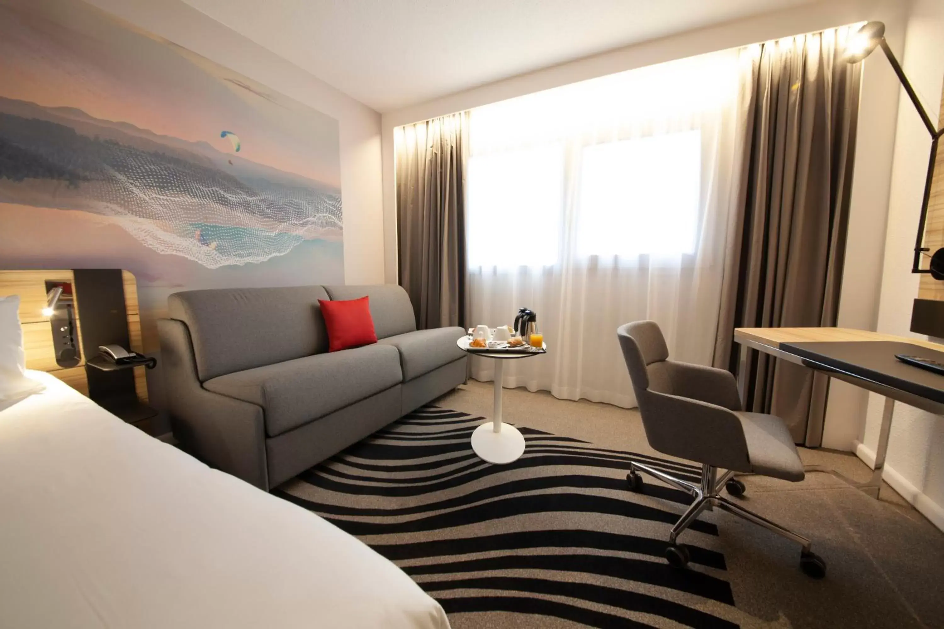 Bedroom, Seating Area in Novotel Clermont-Ferrand