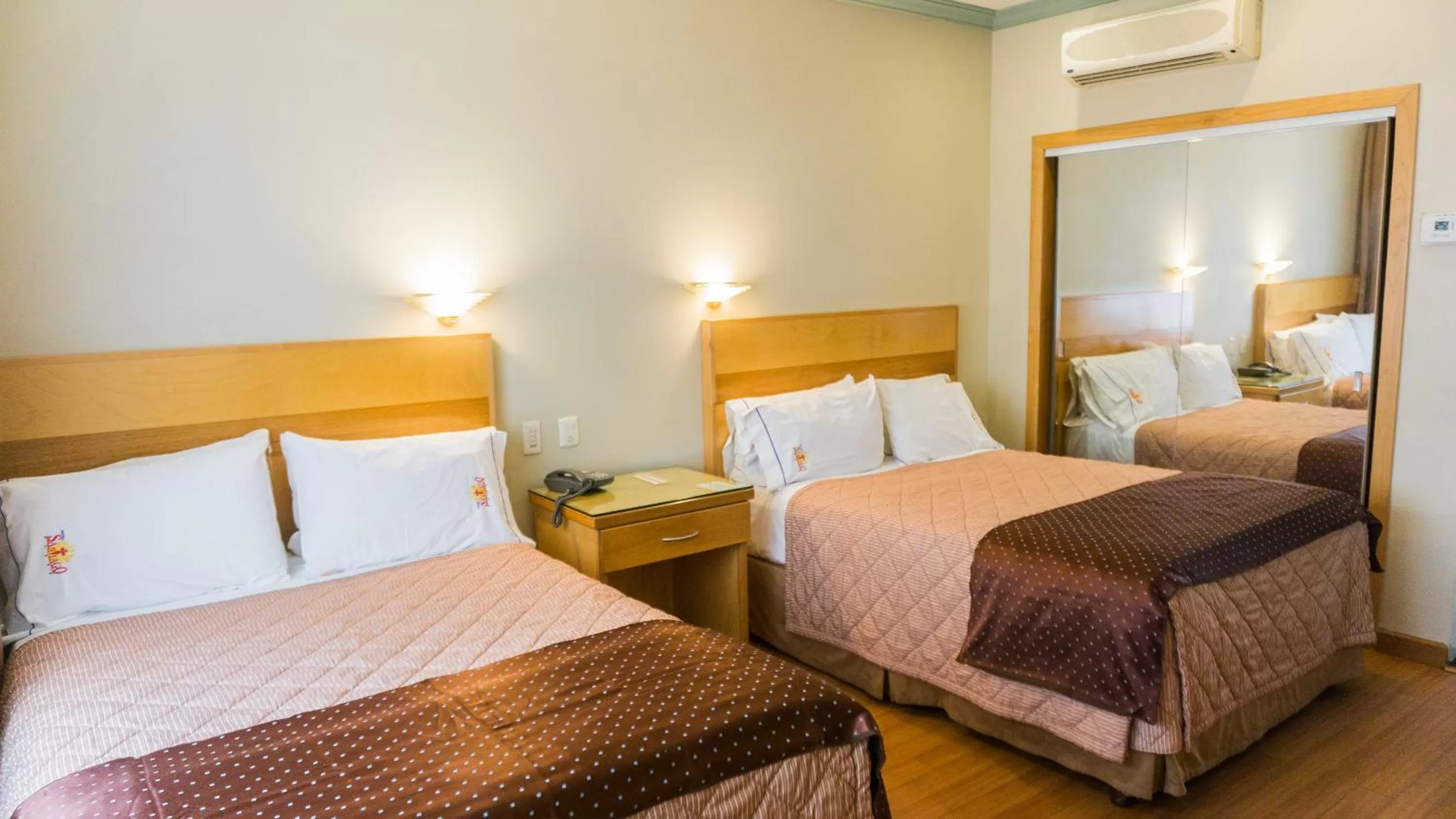 Bed in Hotel Santiago Plaza