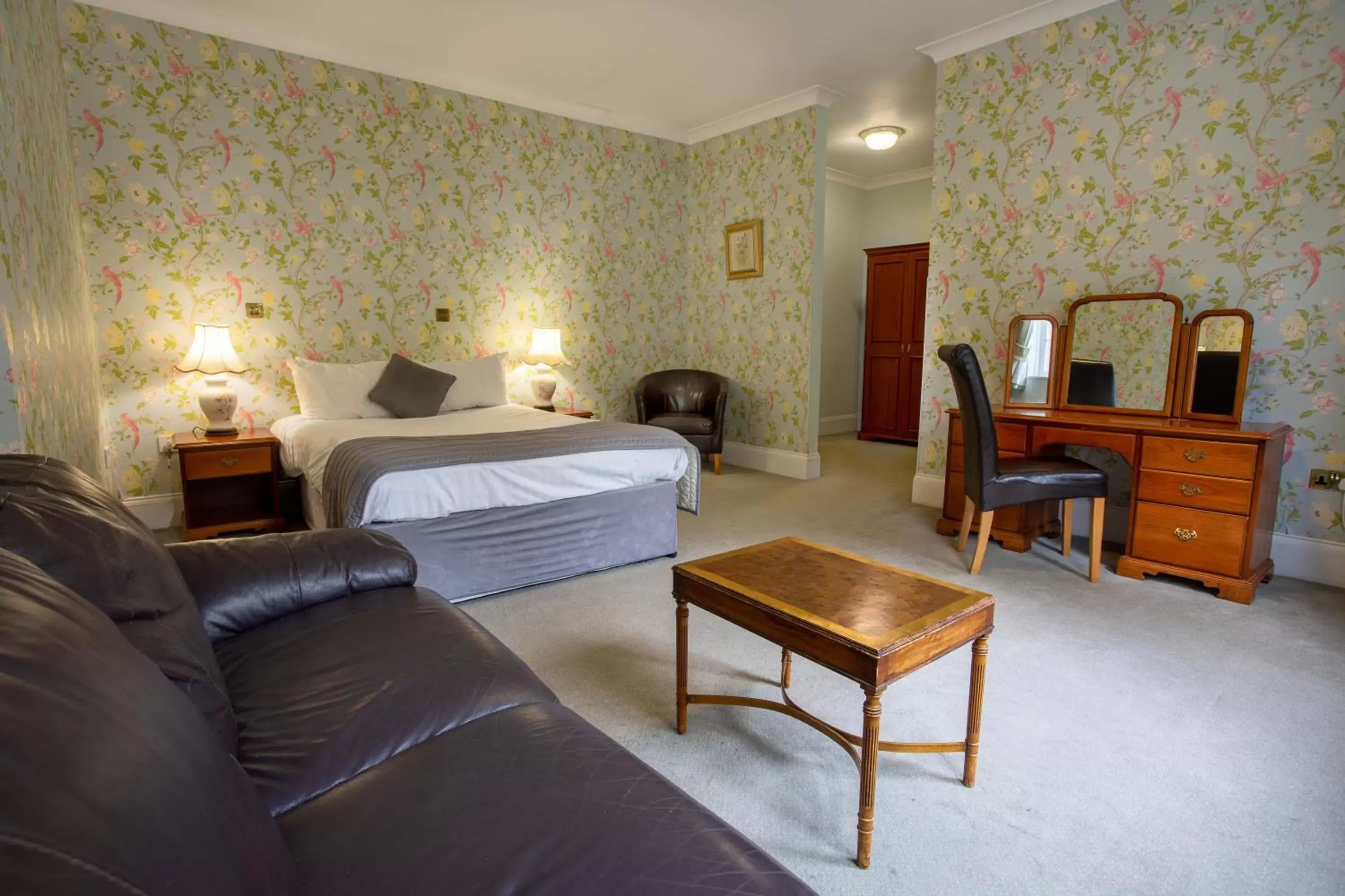 Bedroom in Woodland Manor Hotel