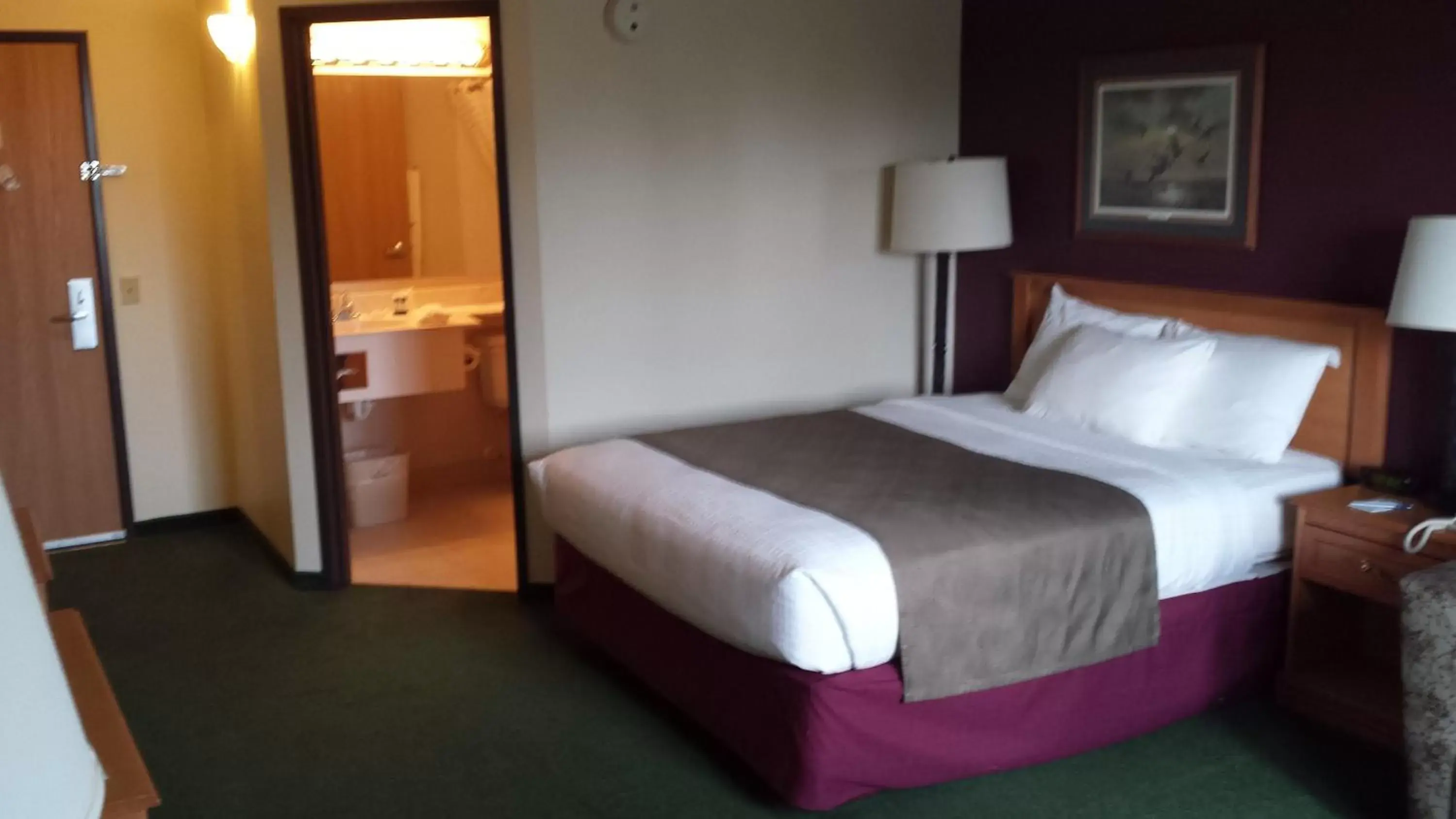 Bed in AmericInn by Wyndham Madison SD Bed in AmericInn by Wyndham Madison SD