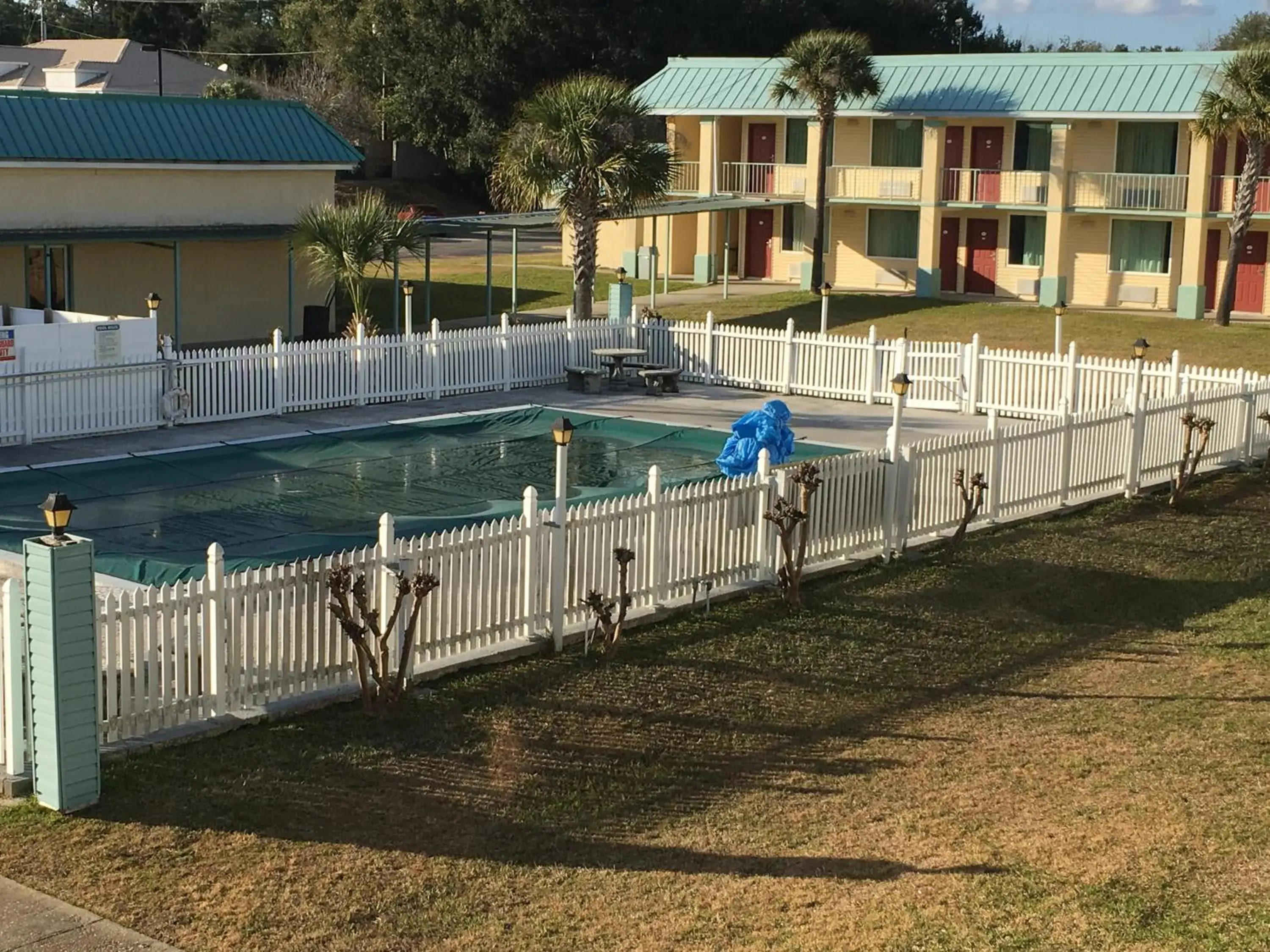 Swimming pool, Property Building in Garden Inn & Suites
