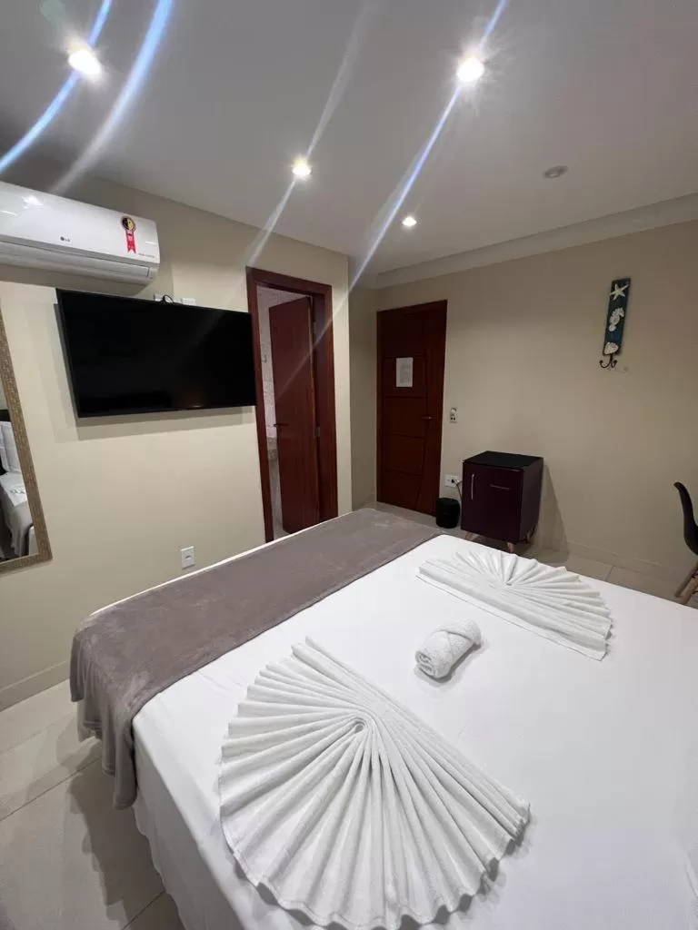 Bed in Pousada Arraial Tropical