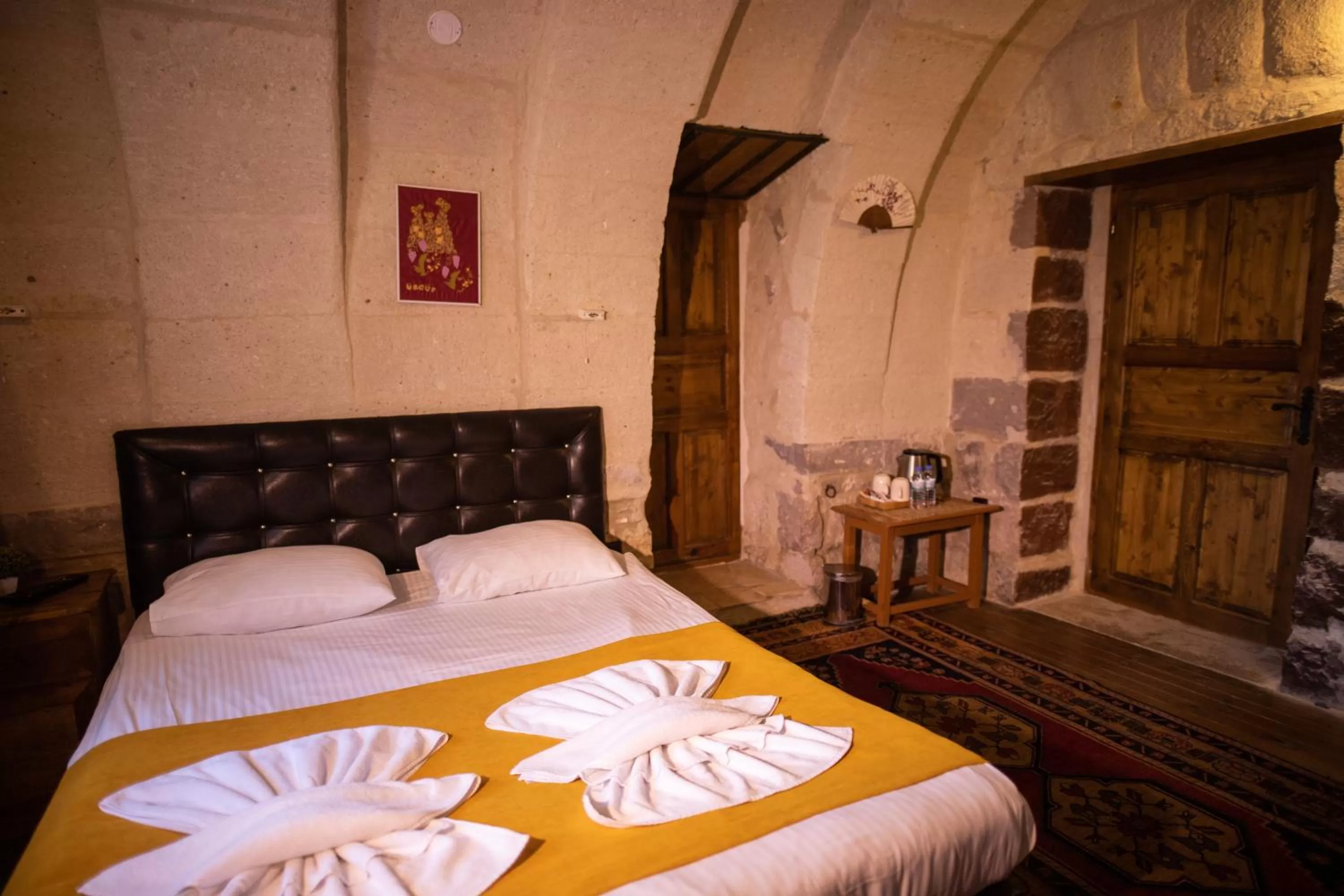 Bed in 7 Oda Kapadokya Cave Hotel