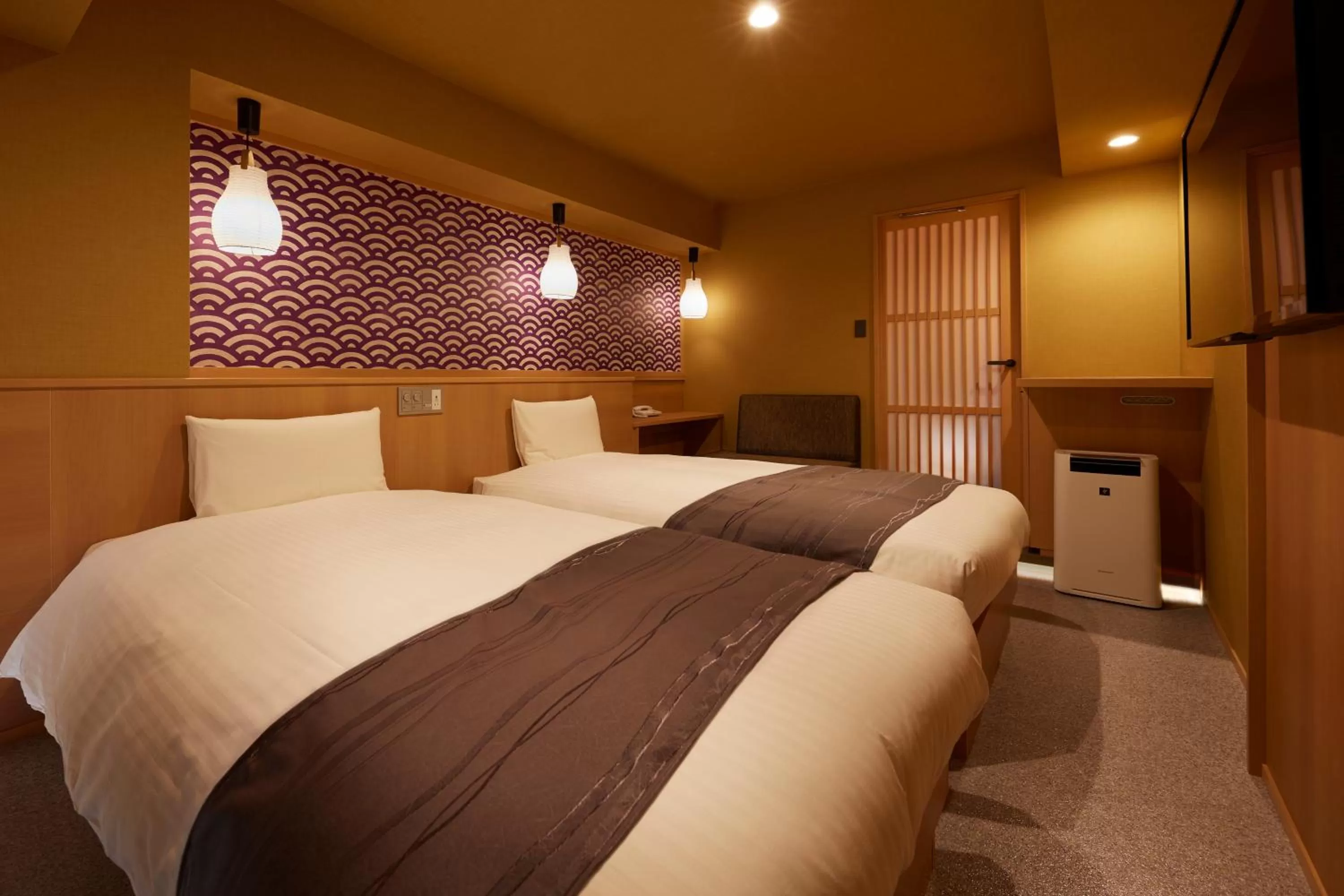 Bed in Sakura Sky Hotel