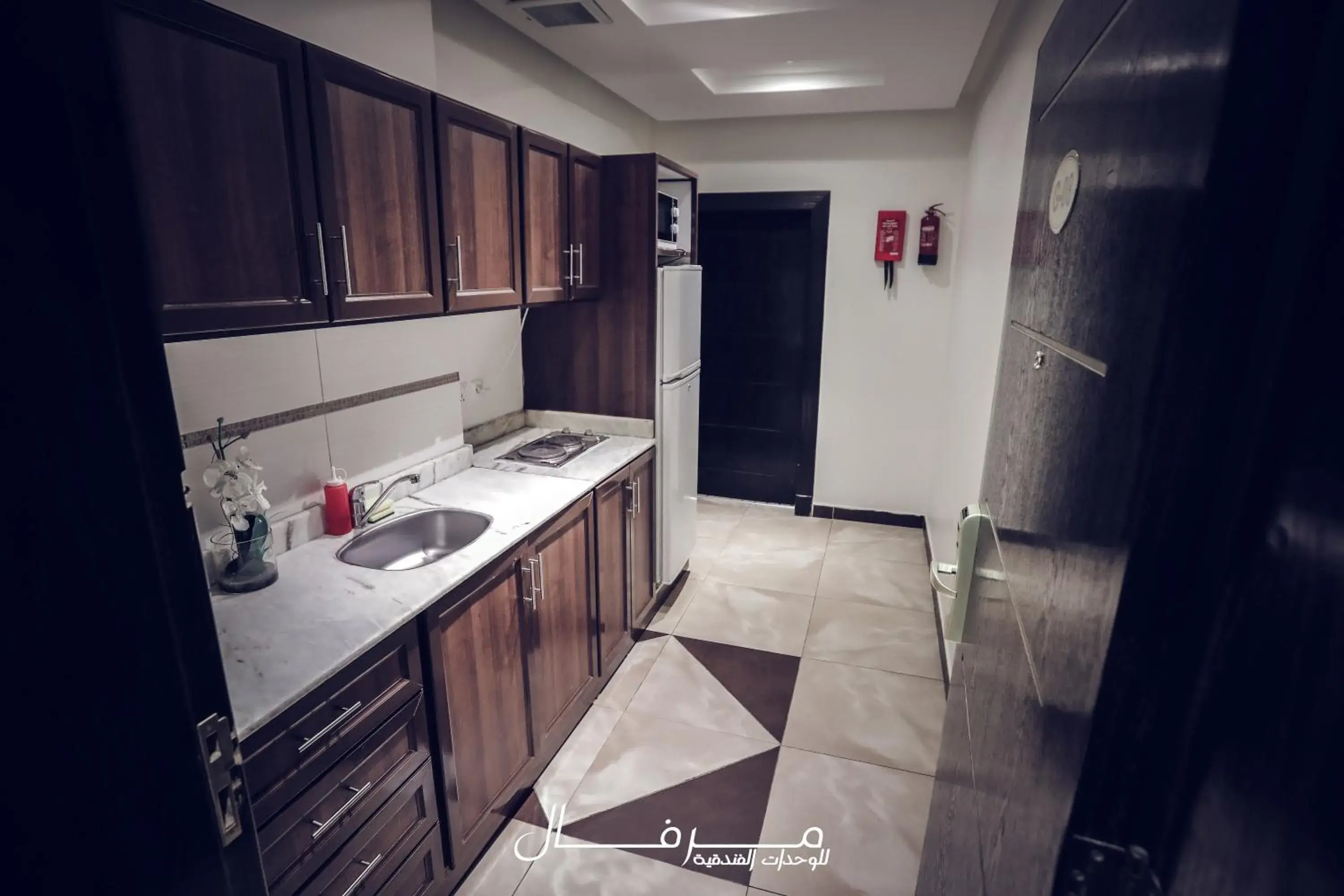 Kitchen or kitchenette, Kitchen/Kitchenette in Merfal Hotel Apartments Al Taawan