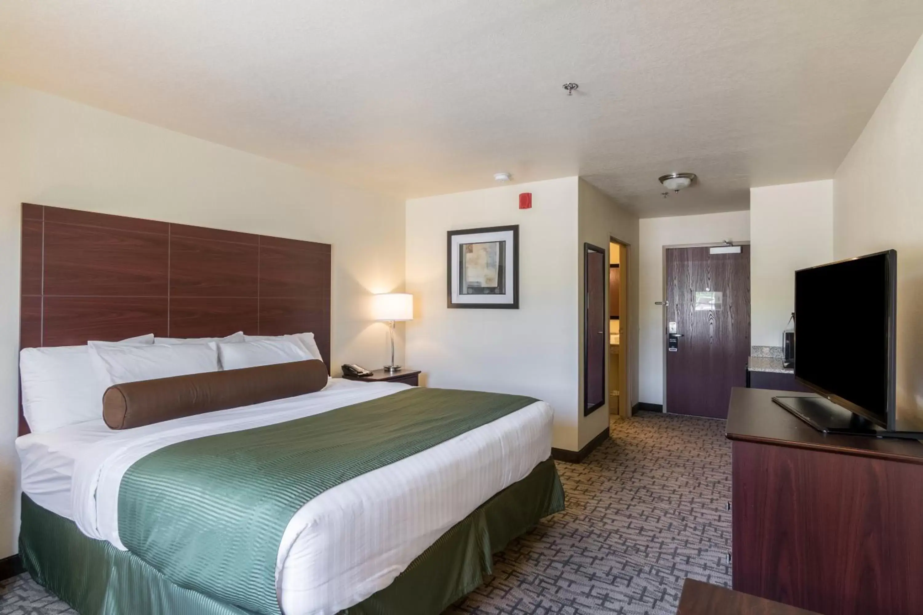 Bed in Cobblestone Inn & Suites - Barron