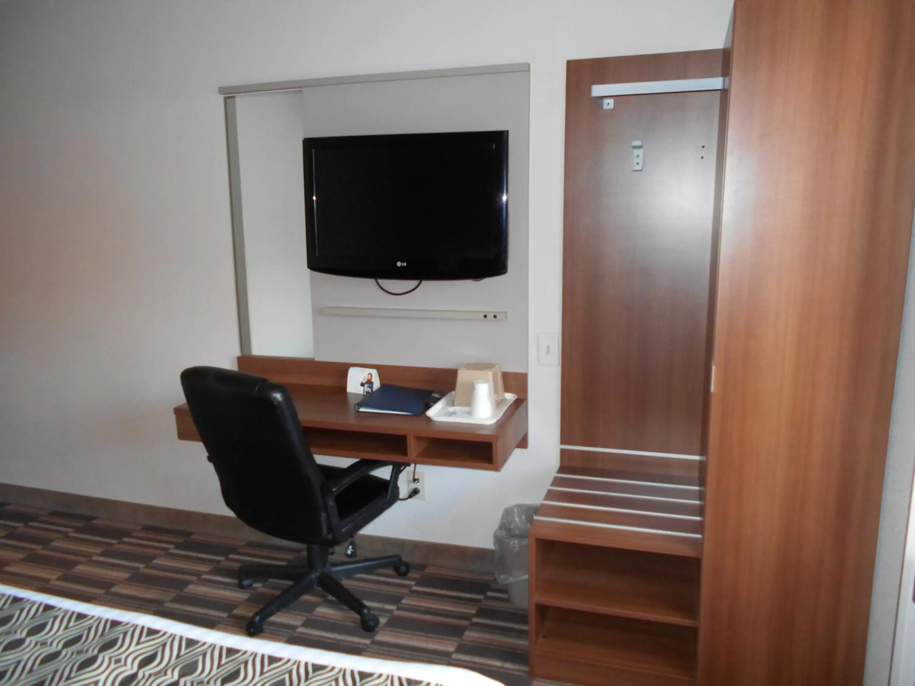 Bedroom, TV/Entertainment Center in Microtel Inn by Wyndham - Albany Airport