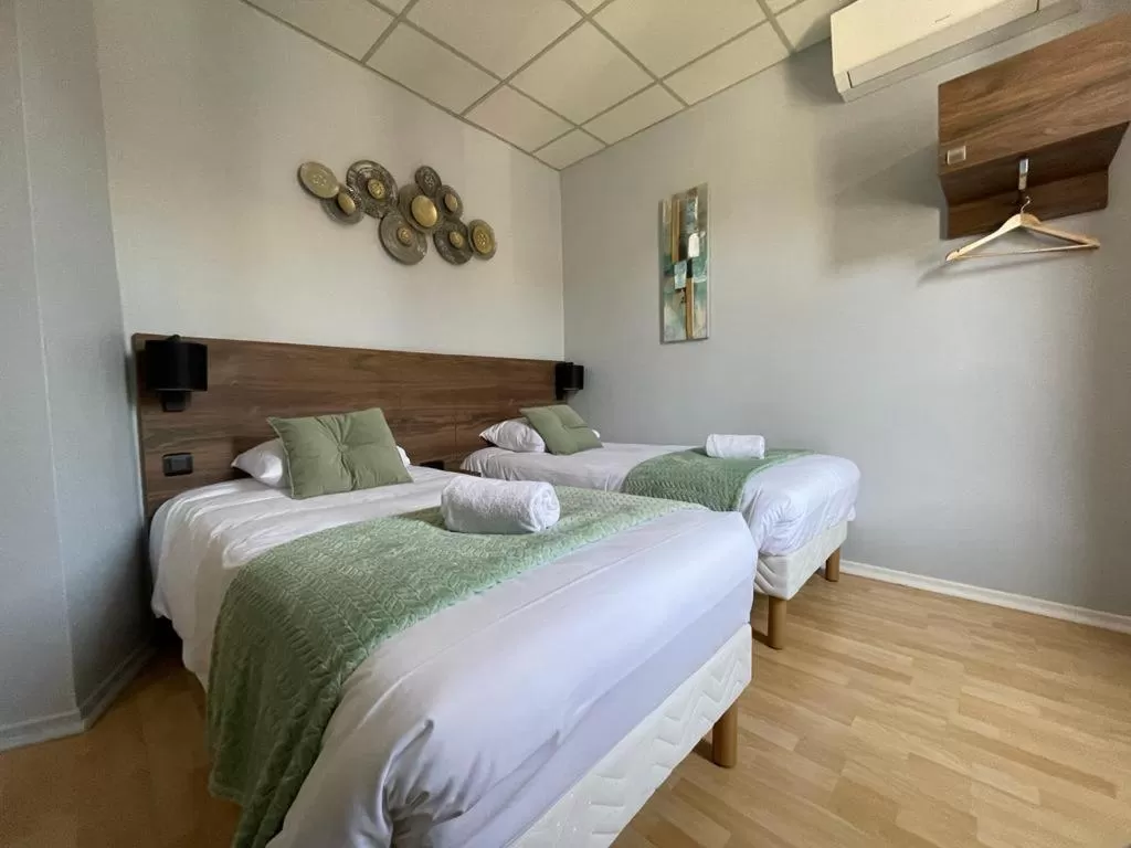 Bed in Hotel Le Rochegude