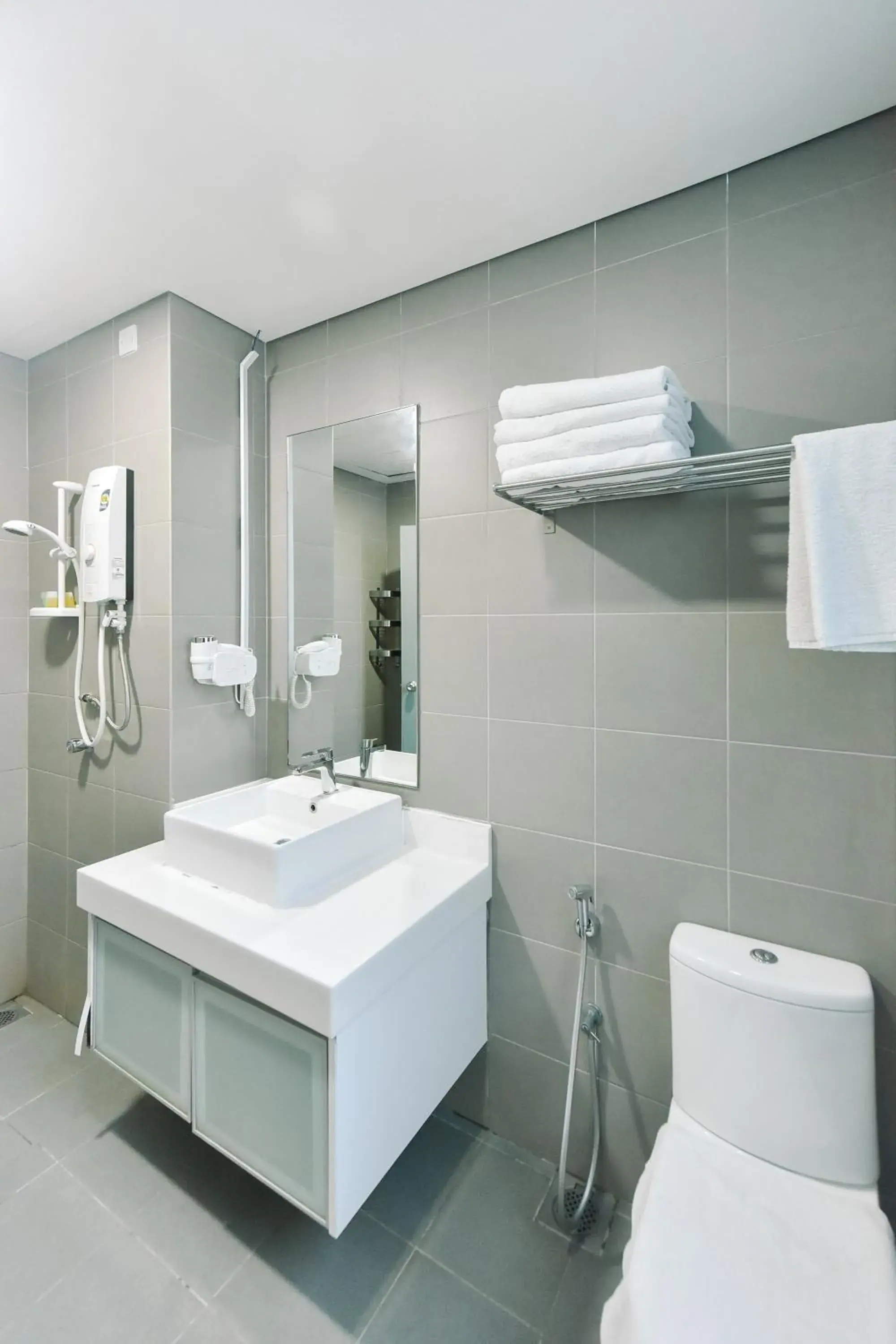 Bathroom in Summer Suites Residences by Subhome Bathroom in Summer Suites Residences by Subhome