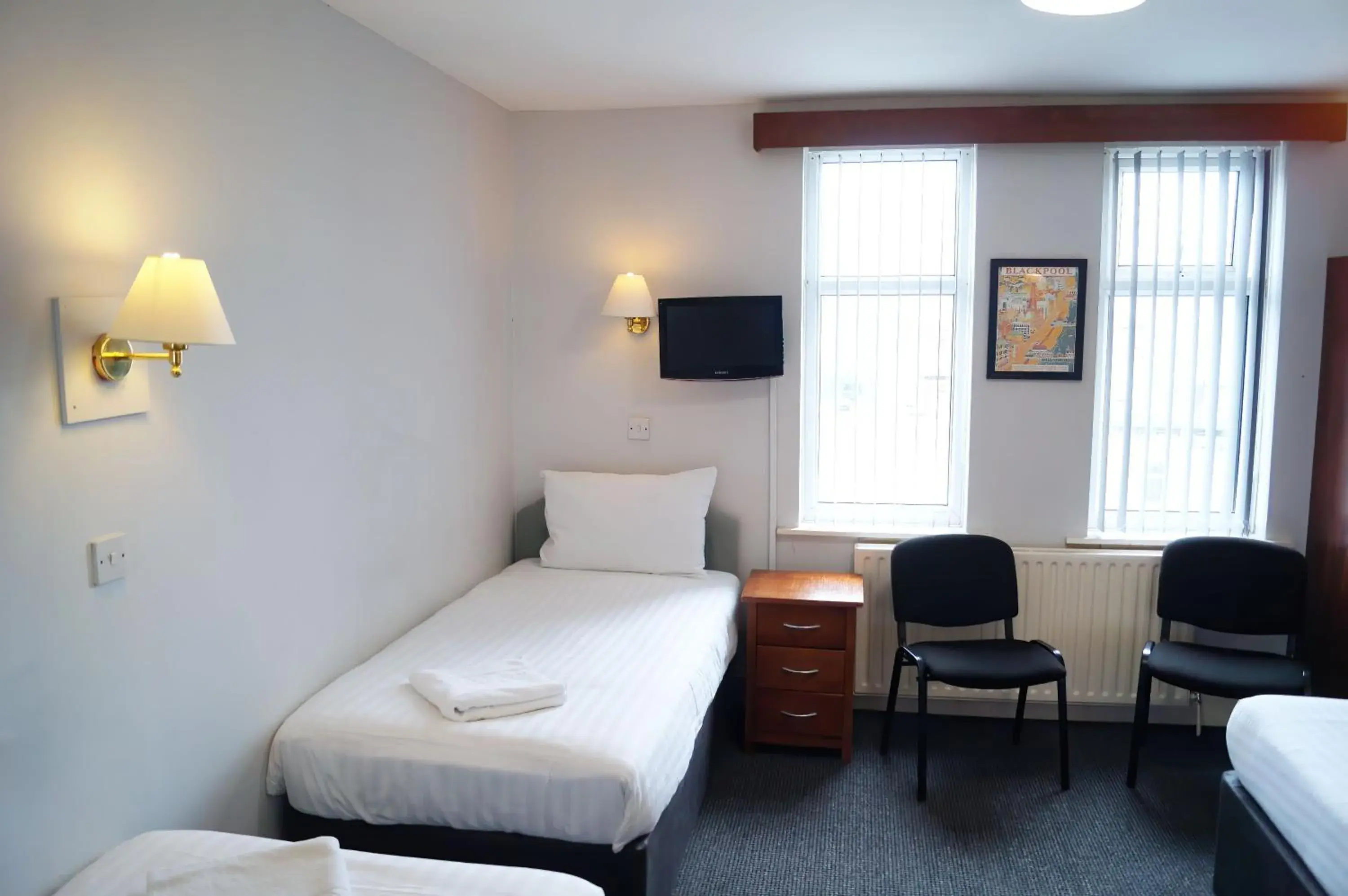 Standard Quadruple Room in Bedford Hotel